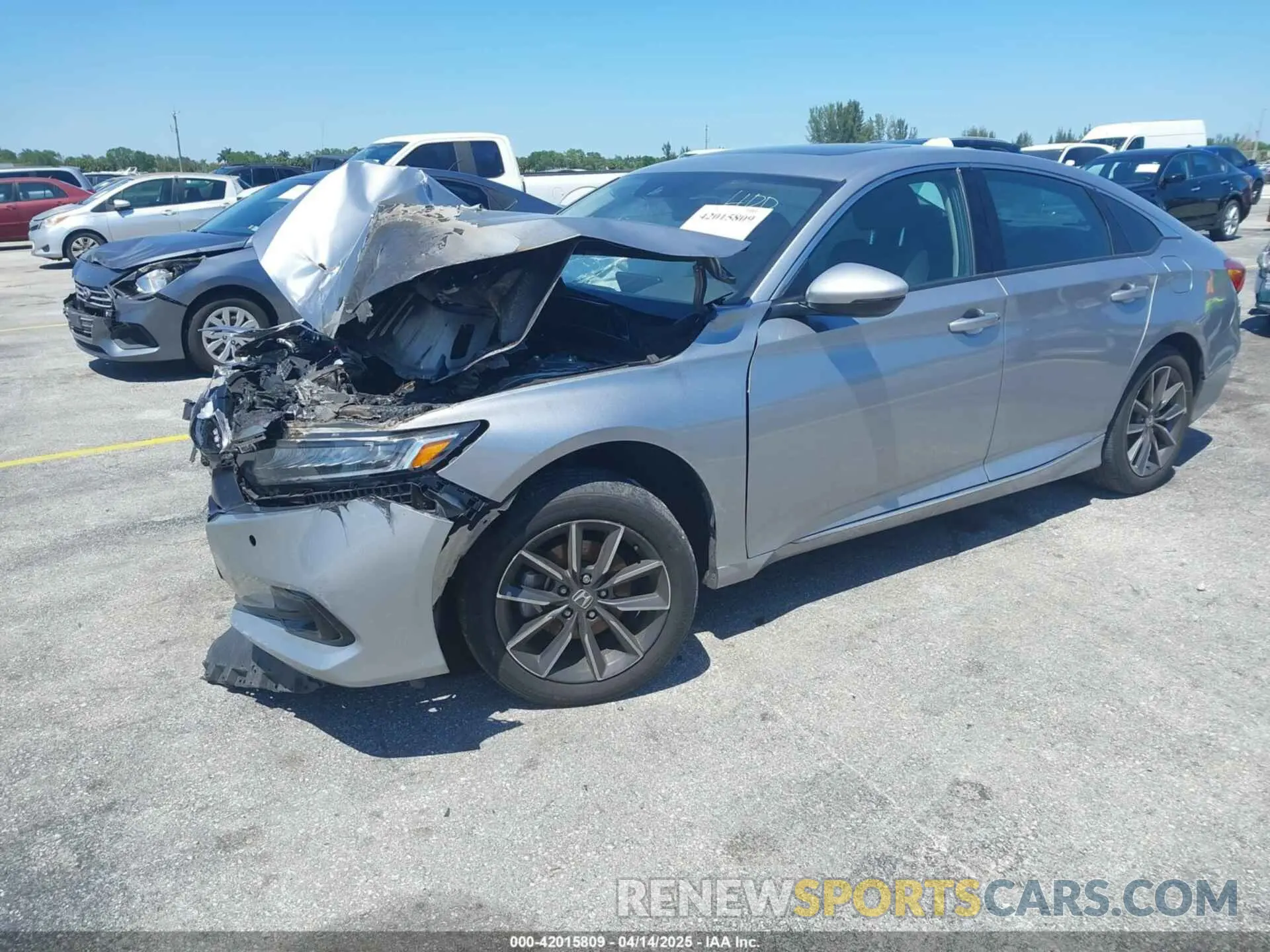 2 fotografías del automóvil dañado 1HGCV1F57NA074736 HONDA ACCORD 2022