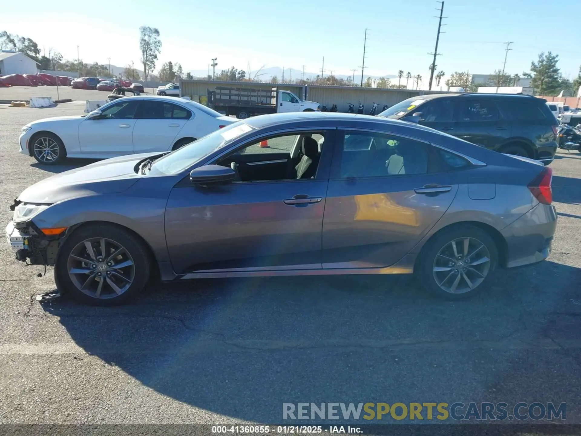 15 fotografías del automóvil dañado 19XFC1F35KE216719 HONDA CIVIC 2019