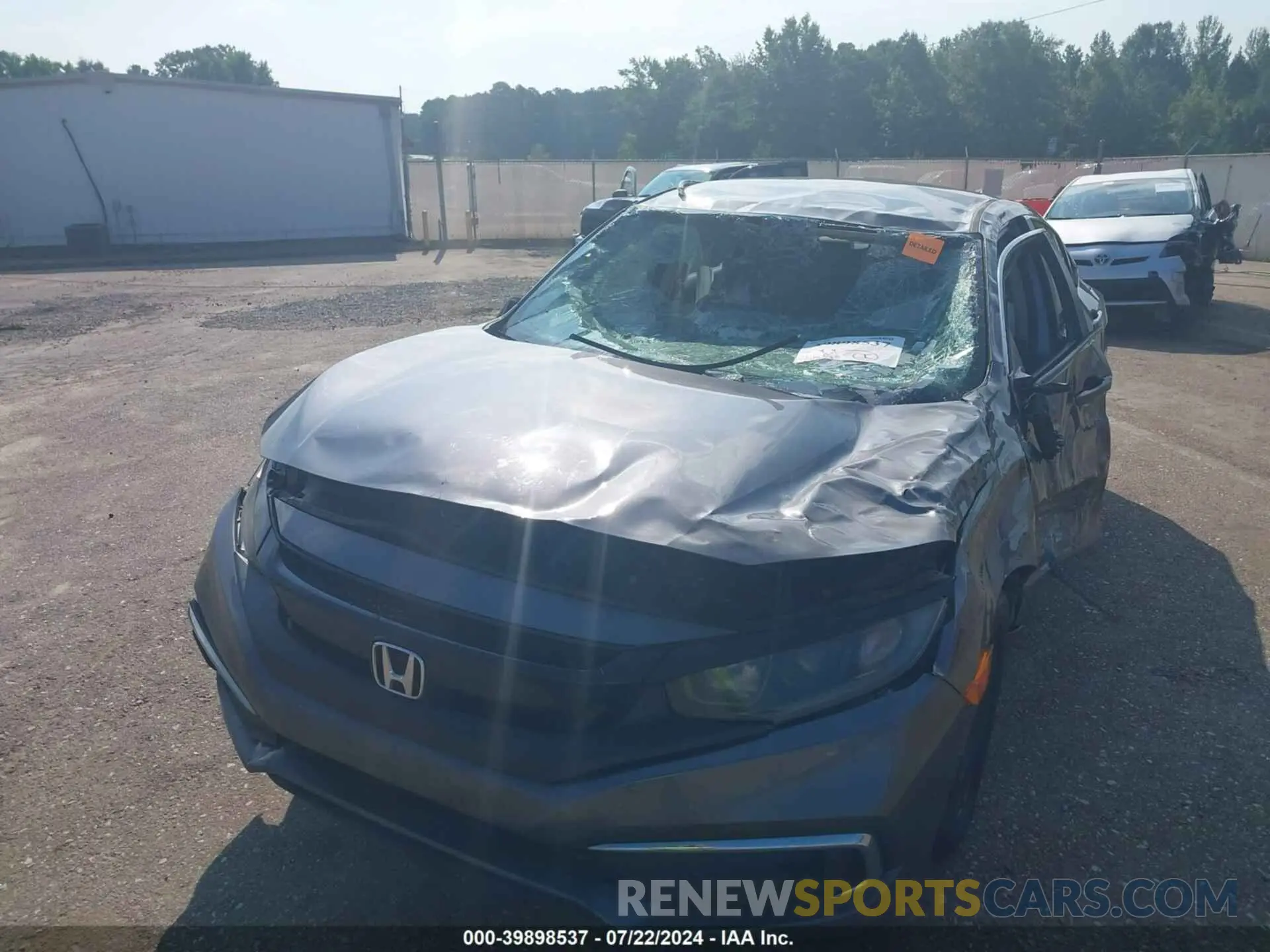 12 fotografías del automóvil dañado 19XFC2F66KE028596 HONDA CIVIC 2019