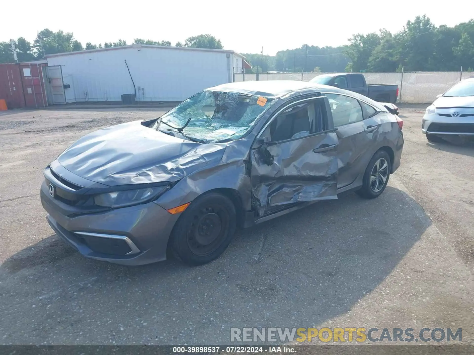 2 fotografías del automóvil dañado 19XFC2F66KE028596 HONDA CIVIC 2019