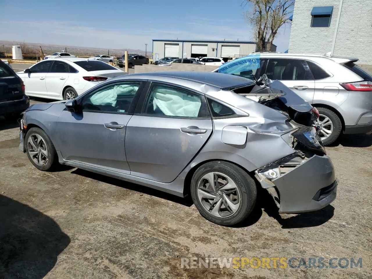 2 fotografías del automóvil dañado 19XFC2F68KE007670 HONDA CIVIC 2019