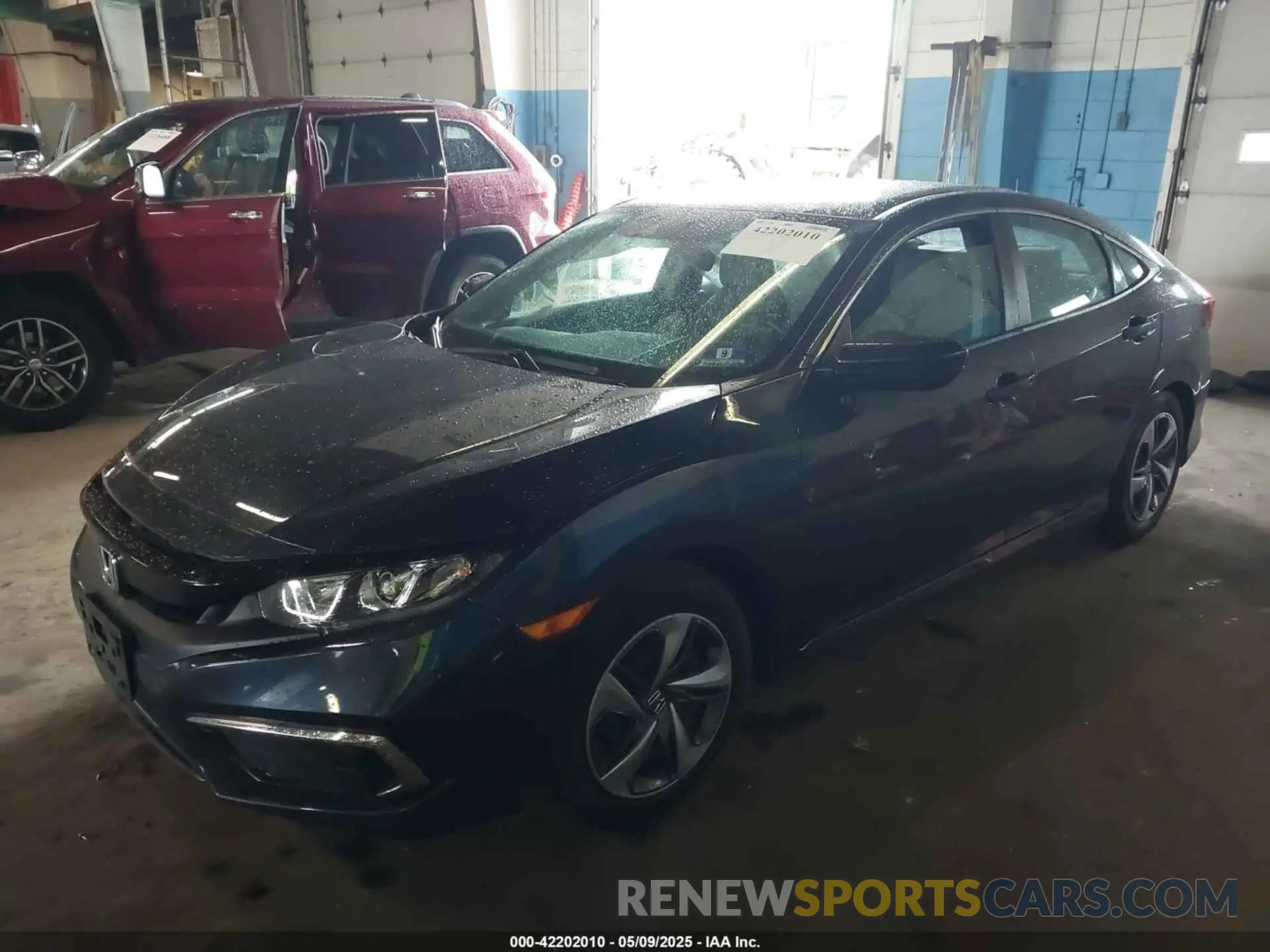 2 fotografías del automóvil dañado 2HGFC2F60KH599328 HONDA CIVIC 2019