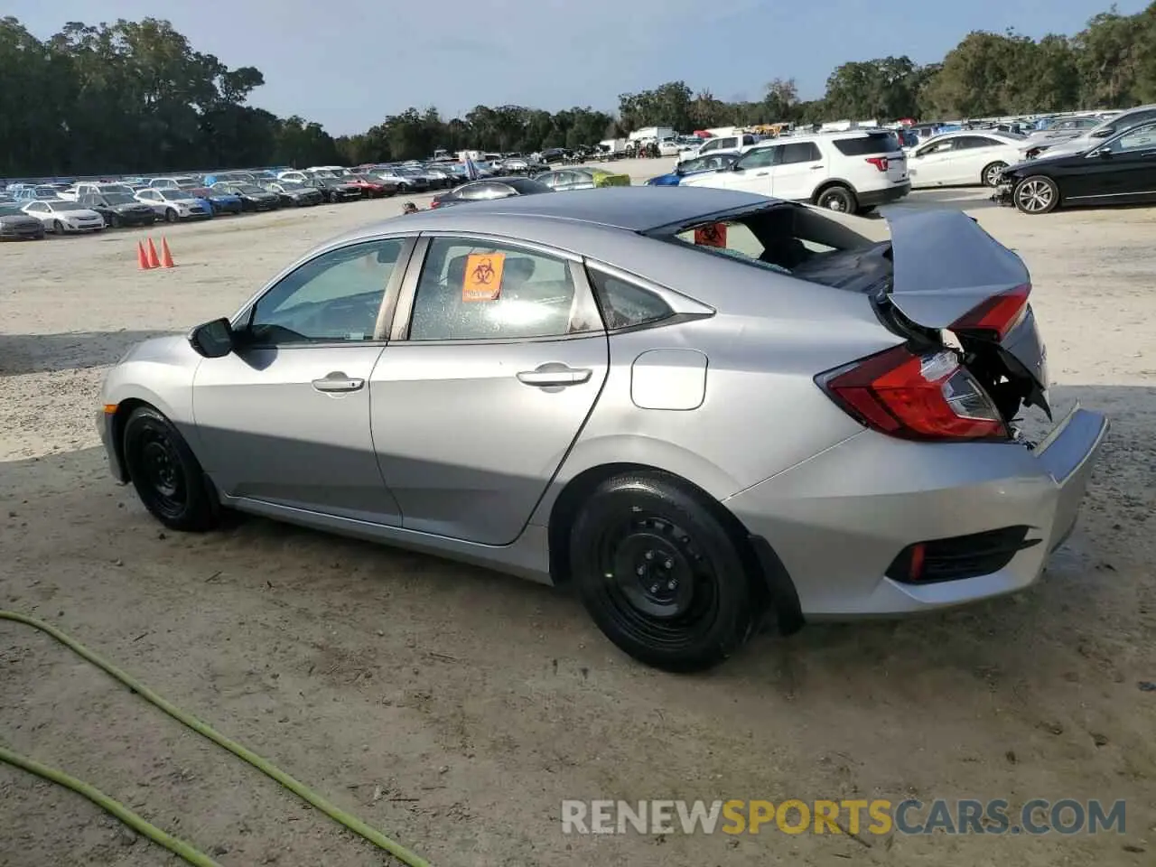 2 fotografías del automóvil dañado 2HGFC2F64KH598215 HONDA CIVIC 2019
