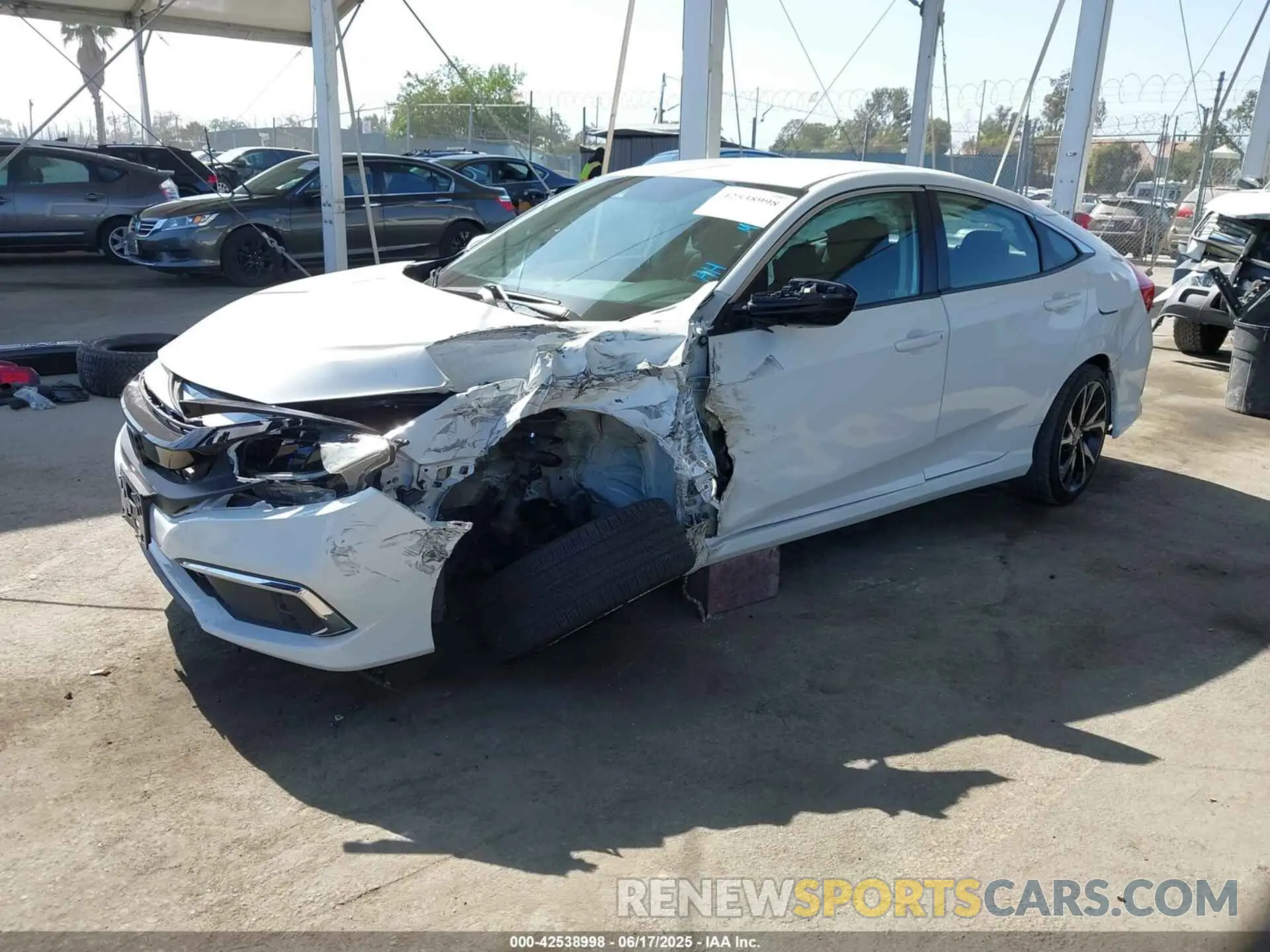 2 fotografías del automóvil dañado 2HGFC2F69KH505902 HONDA CIVIC 2019