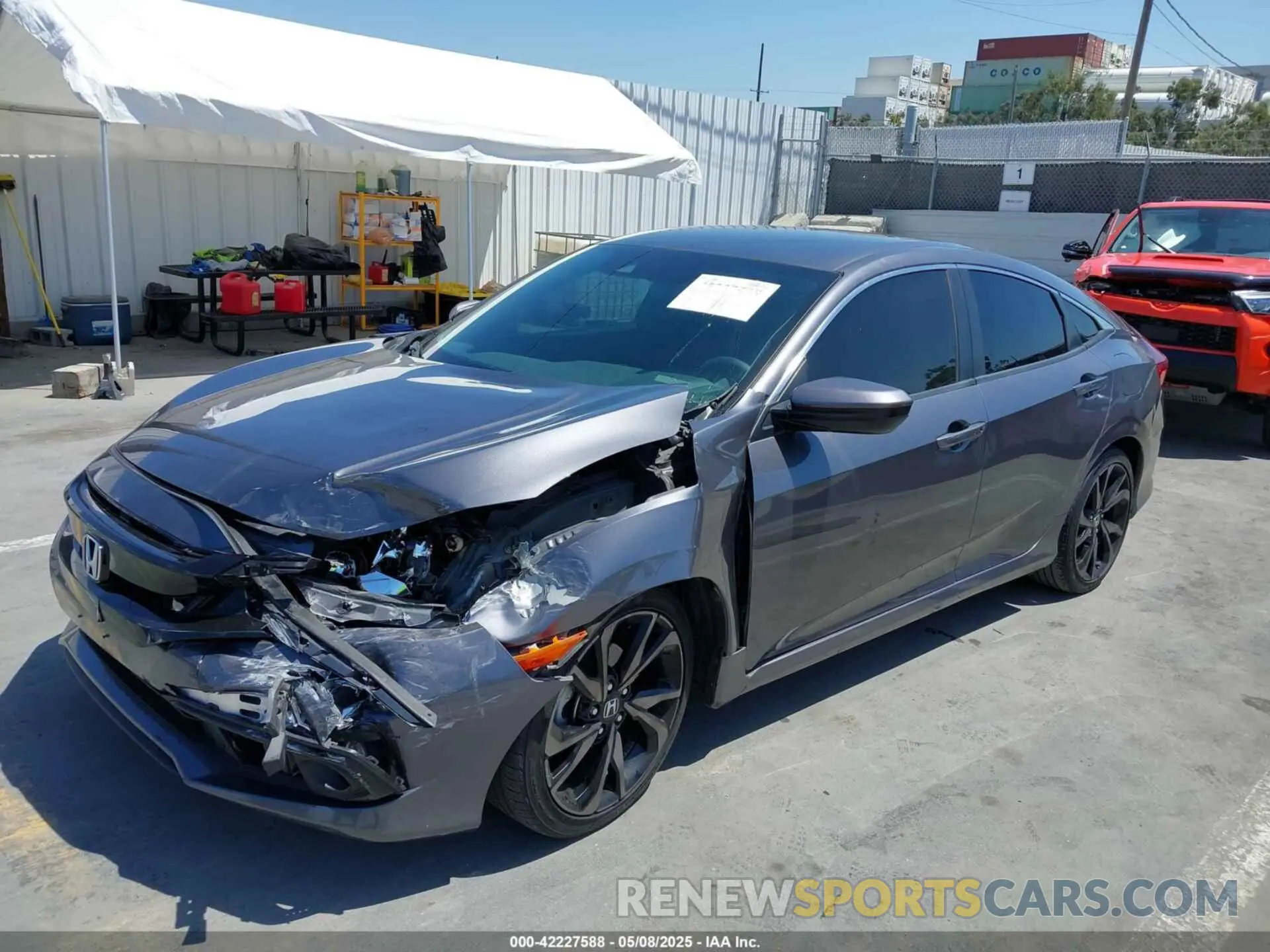 2 fotografías del automóvil dañado 2HGFC2F89KH503942 HONDA CIVIC 2019