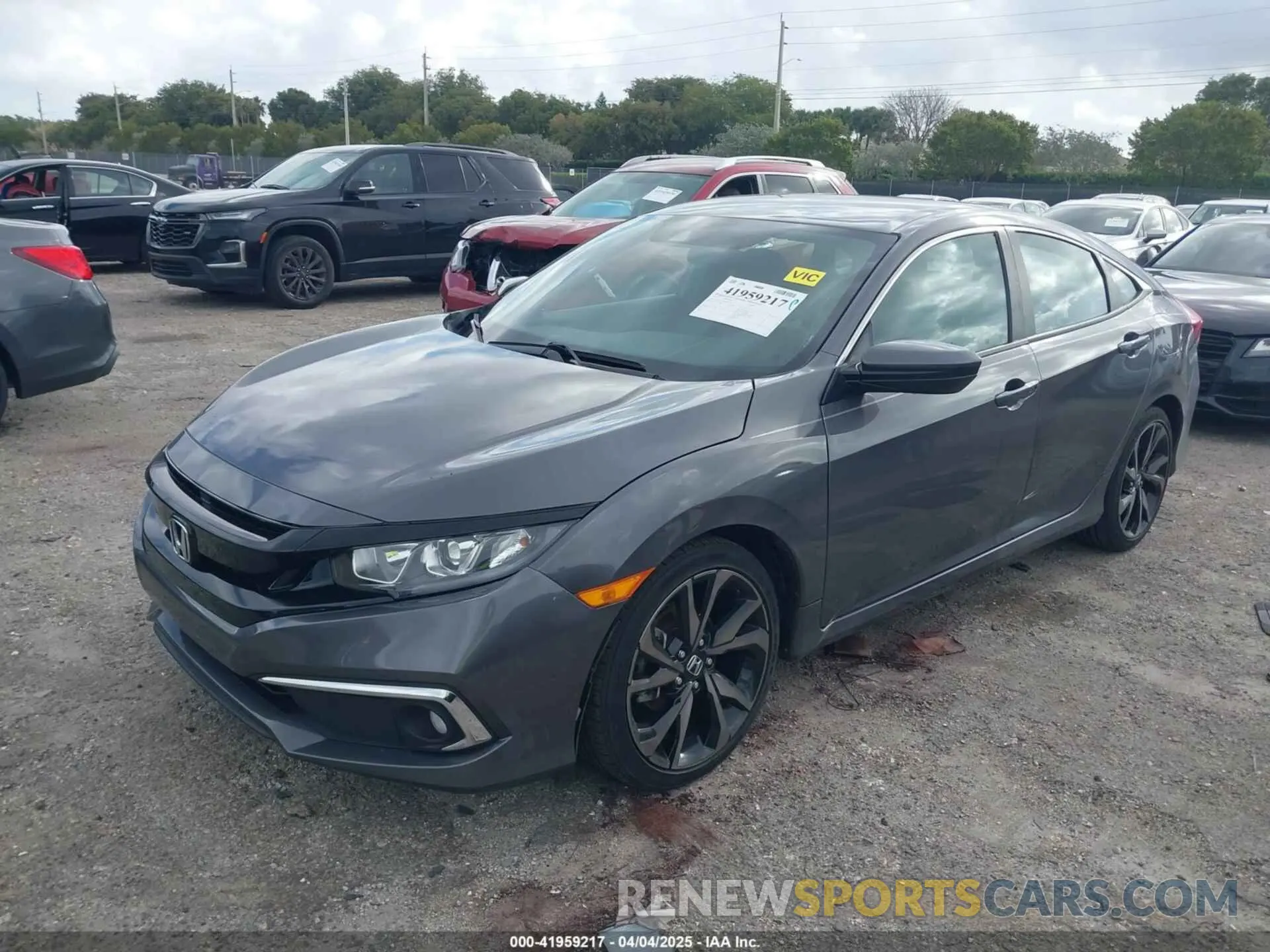 2 fotografías del automóvil dañado 2HGFC2F89KH563333 HONDA CIVIC 2019