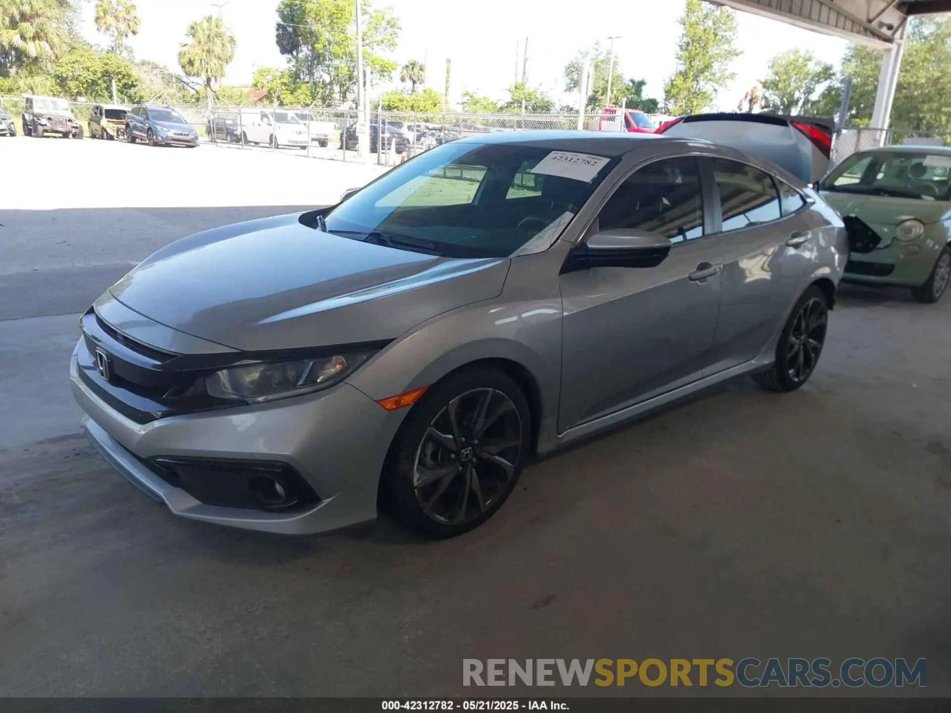 2 fotografías del automóvil dañado 2HGFC2F8XKH579802 HONDA CIVIC 2019