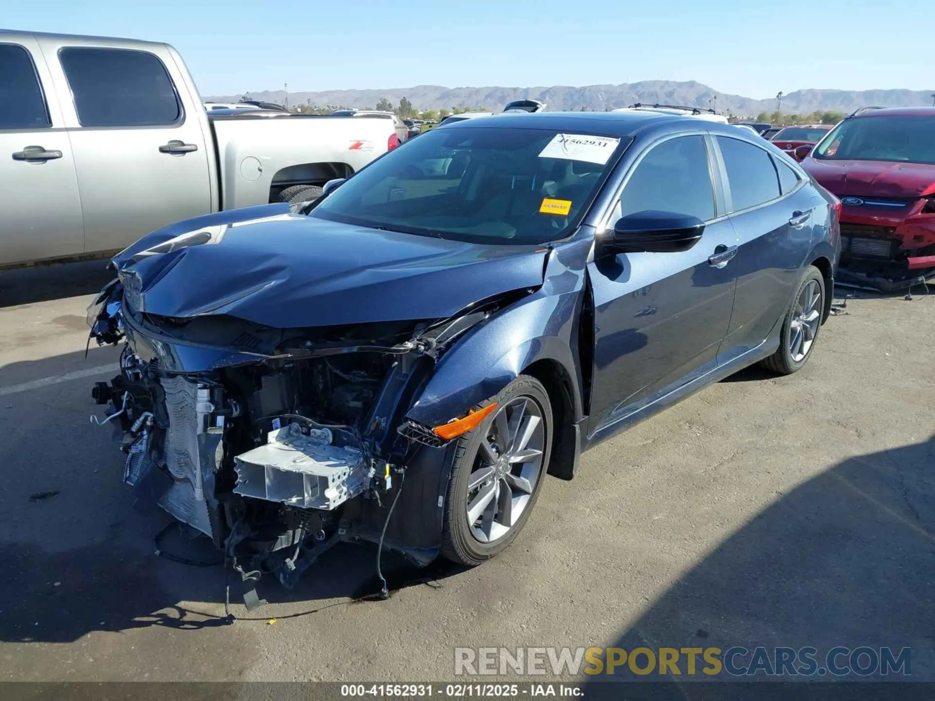 2 fotografías del automóvil dañado 19XFC1F33LE020280 HONDA CIVIC 2020