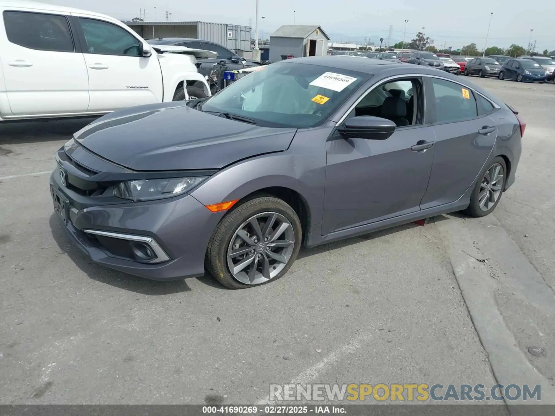 2 fotografías del automóvil dañado 19XFC1F74LE204193 HONDA CIVIC 2020