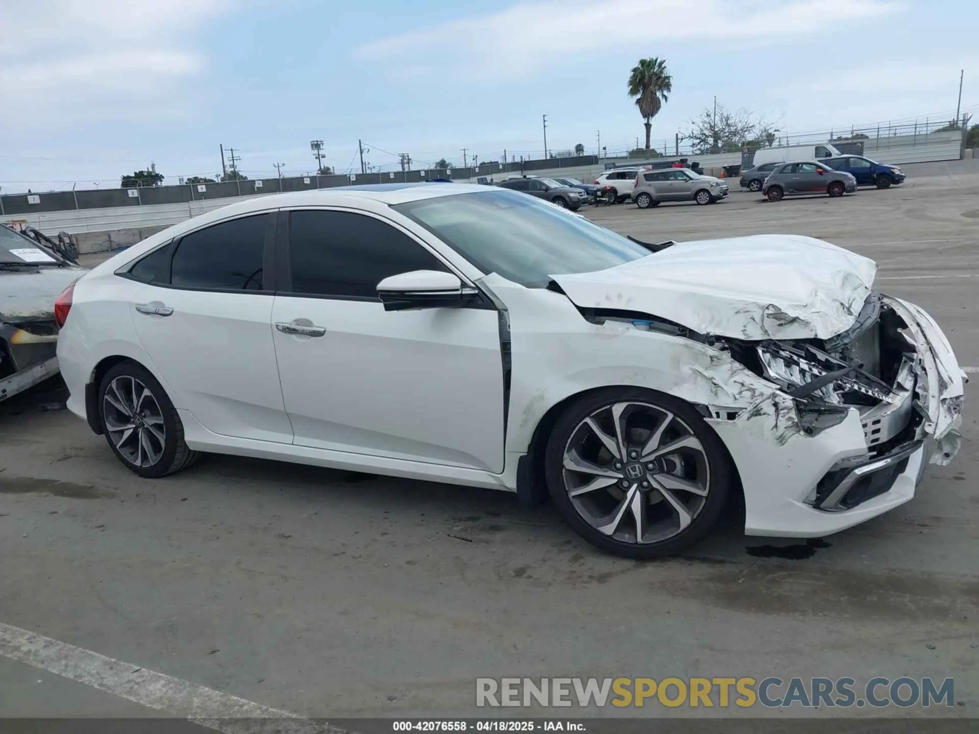 13 fotografías del automóvil dañado 19XFC1F91LE213631 HONDA CIVIC 2020