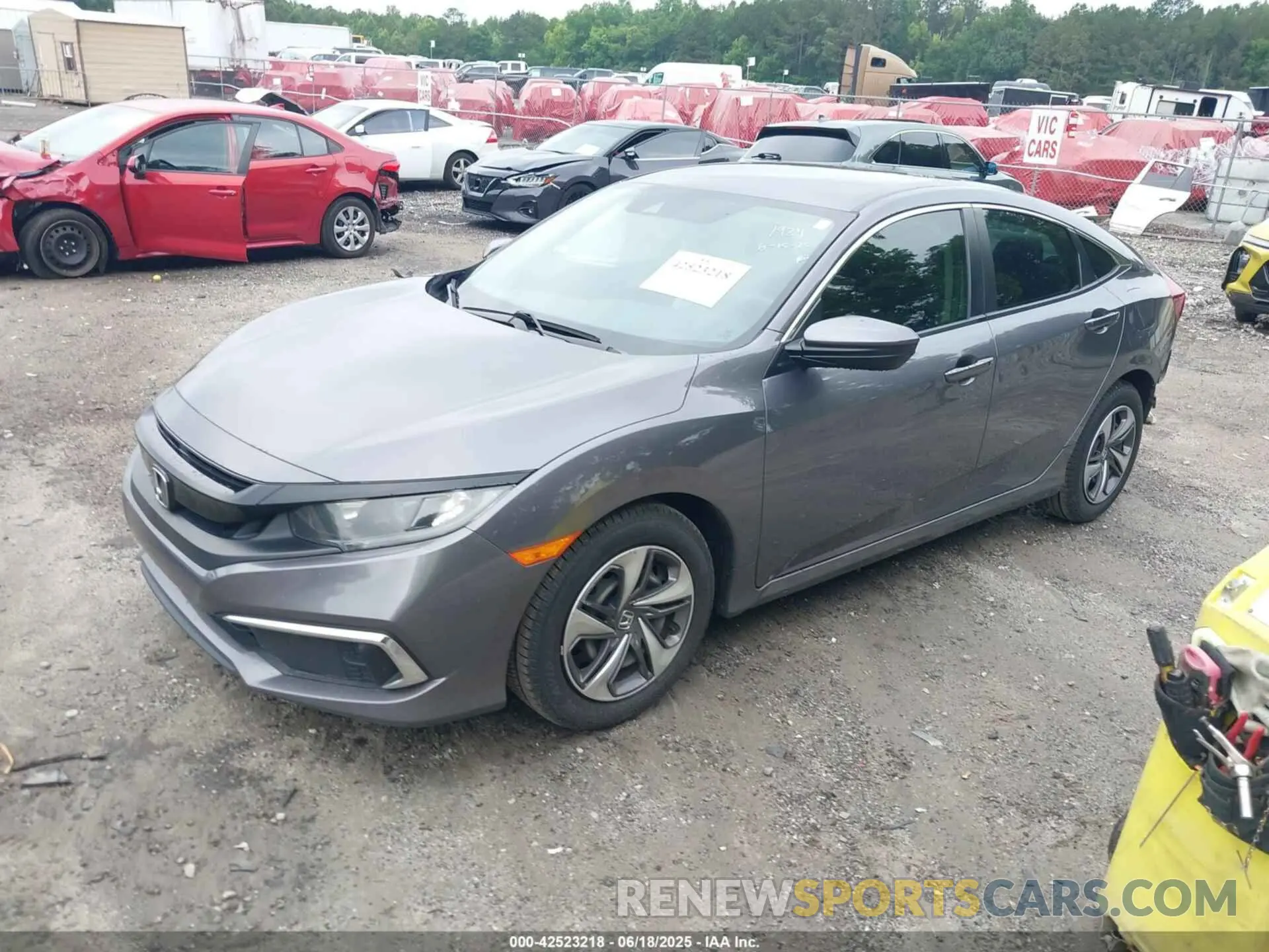 2 fotografías del automóvil dañado 19XFC2F67LE016717 HONDA CIVIC 2020