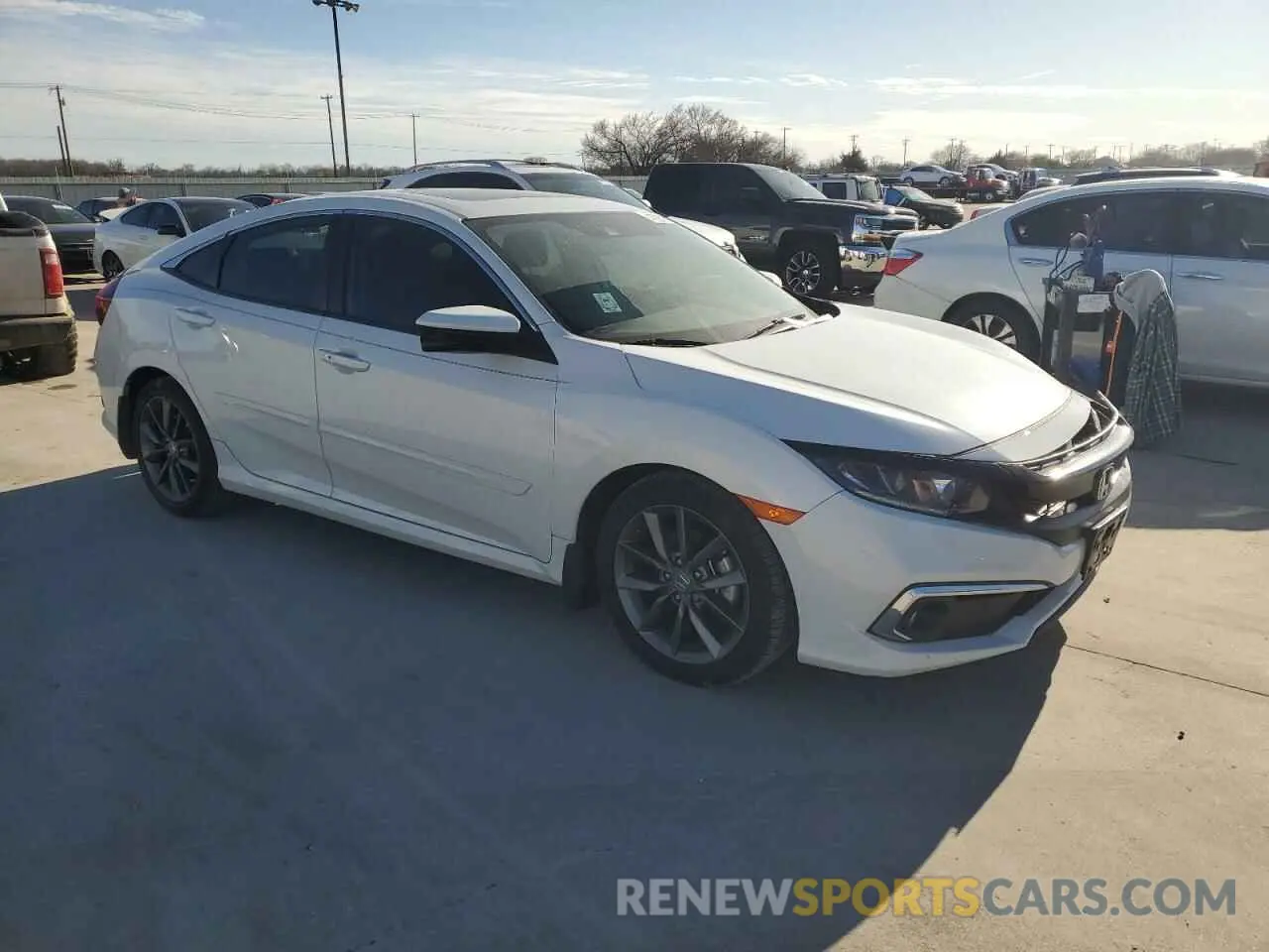 4 fotografías del automóvil dañado 2HGFC1F36MH703582 HONDA CIVIC 2021