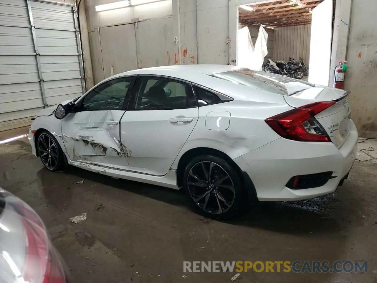 2 fotografías del automóvil dañado 2HGFC2F8XMH520512 HONDA CIVIC 2021