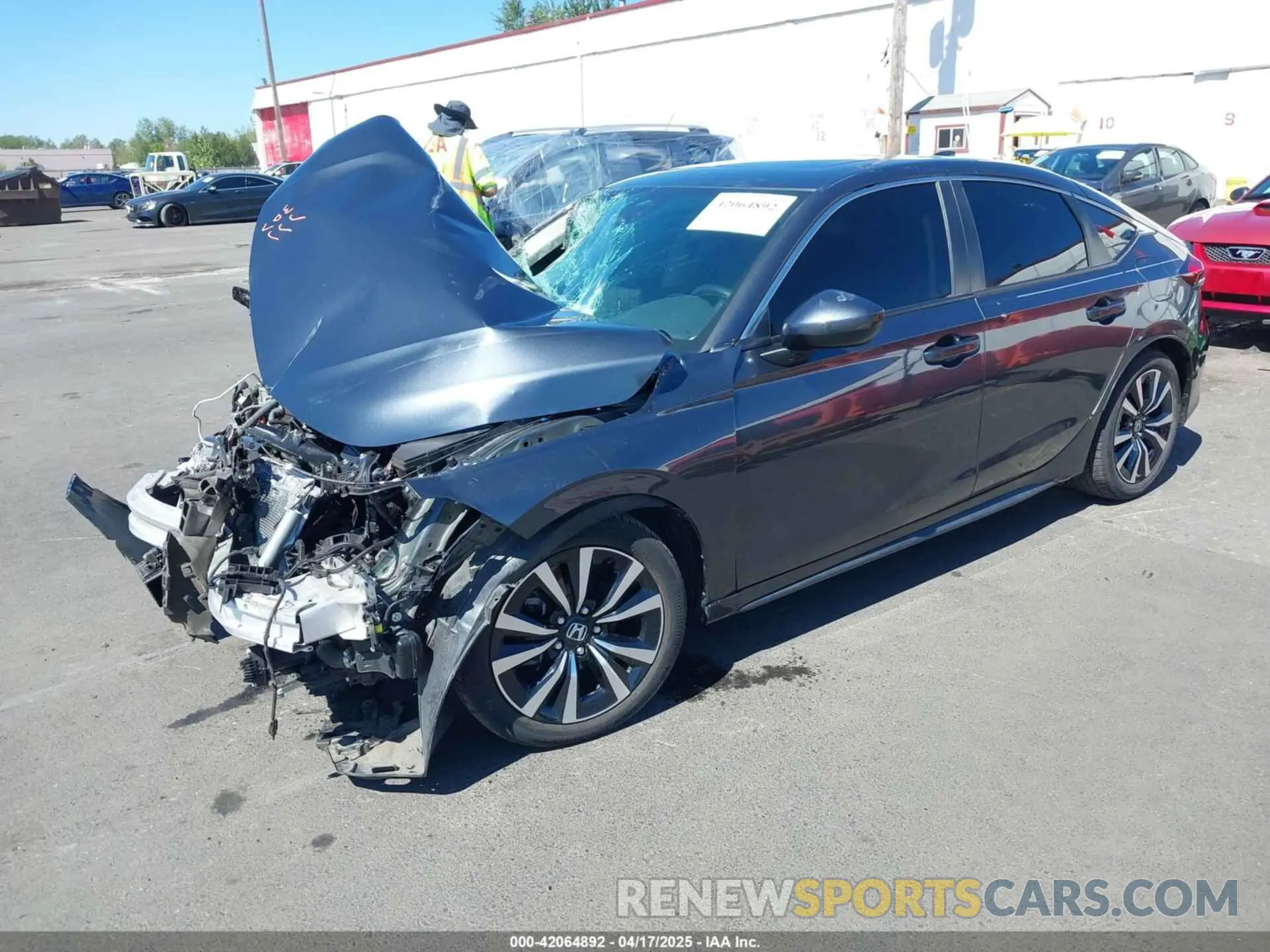 2 fotografías del automóvil dañado 19XFL1H7XNE013345 HONDA CIVIC 2022
