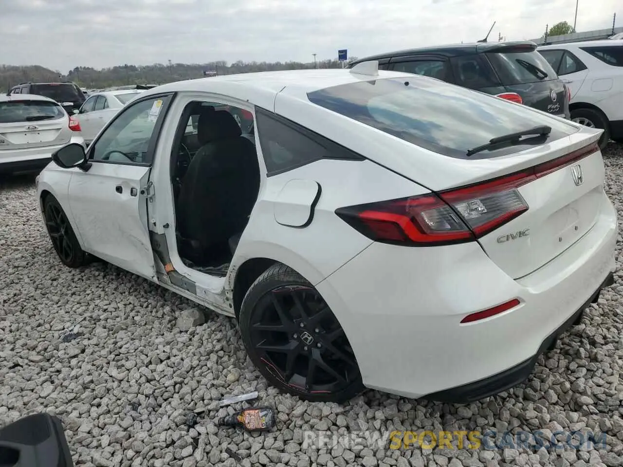 2 fotografías del automóvil dañado 19XFL2H8XNE007334 HONDA CIVIC 2022