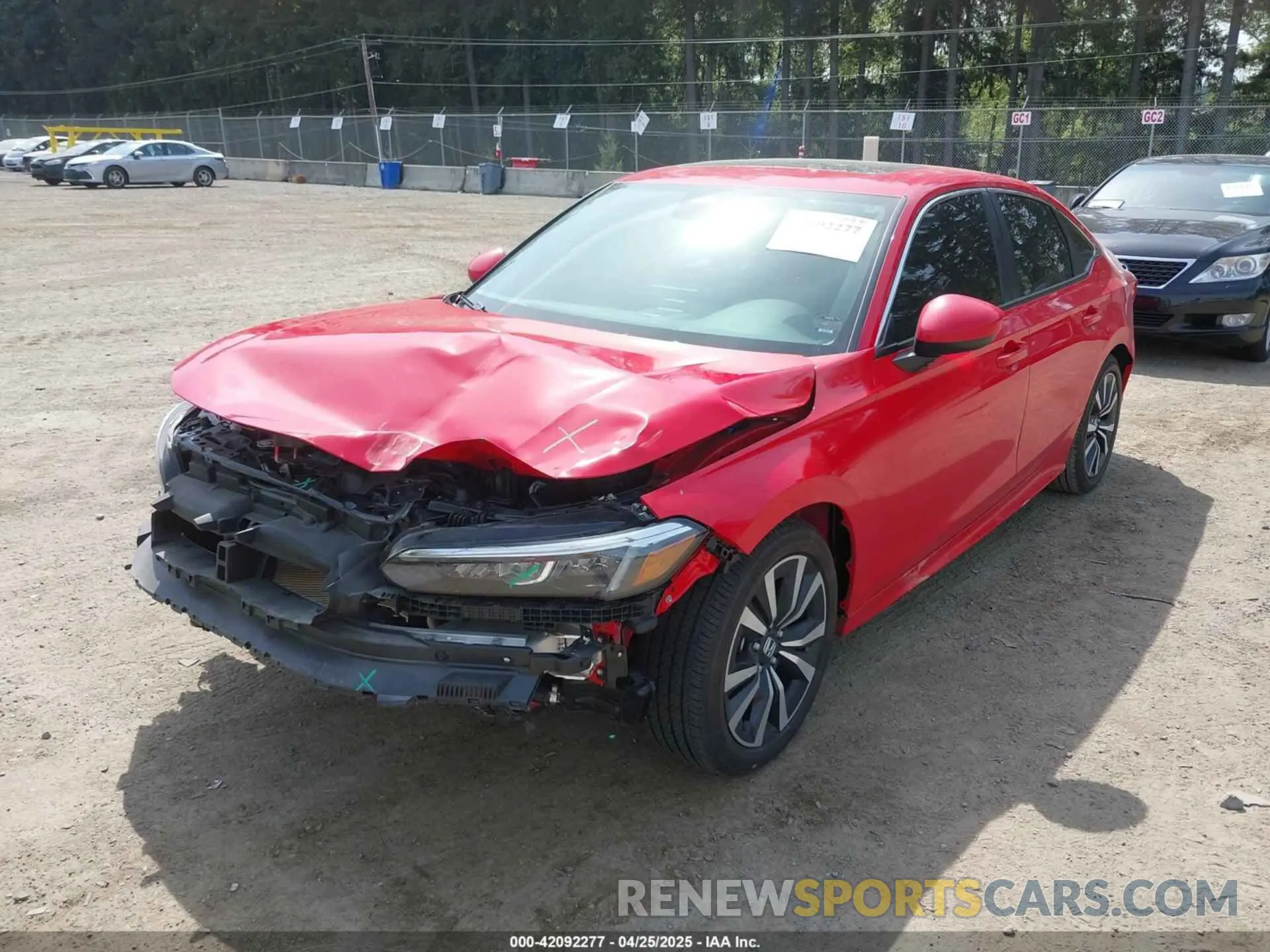 2 fotografías del automóvil dañado 2HGFE1F71NH328974 HONDA CIVIC 2022
