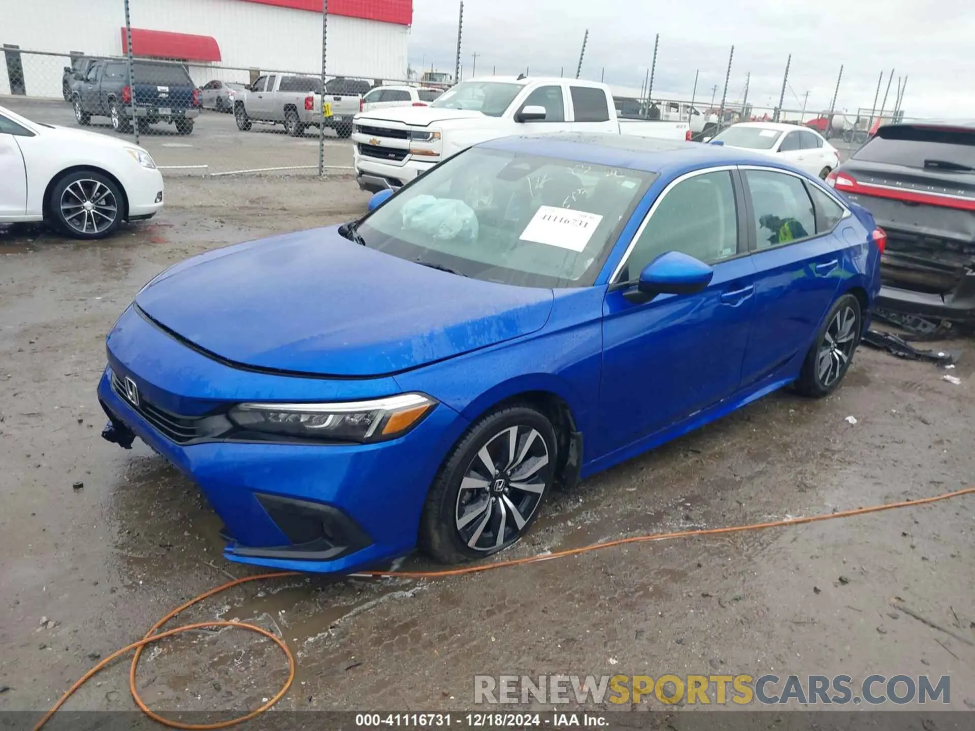 2 fotografías del automóvil dañado 2HGFE1F74NH325843 HONDA CIVIC 2022