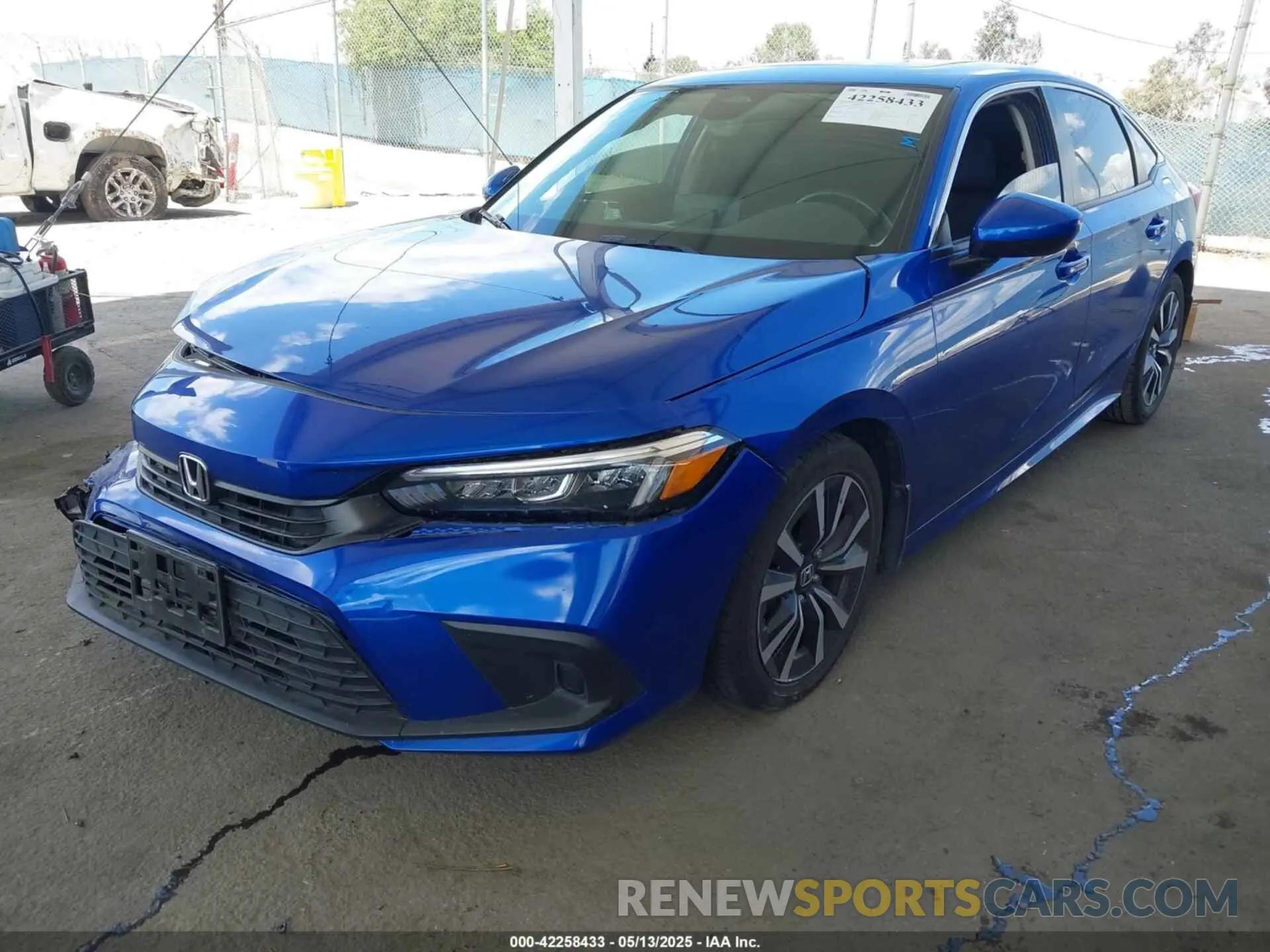 2 fotografías del automóvil dañado 2HGFE1F79NH313672 HONDA CIVIC 2022