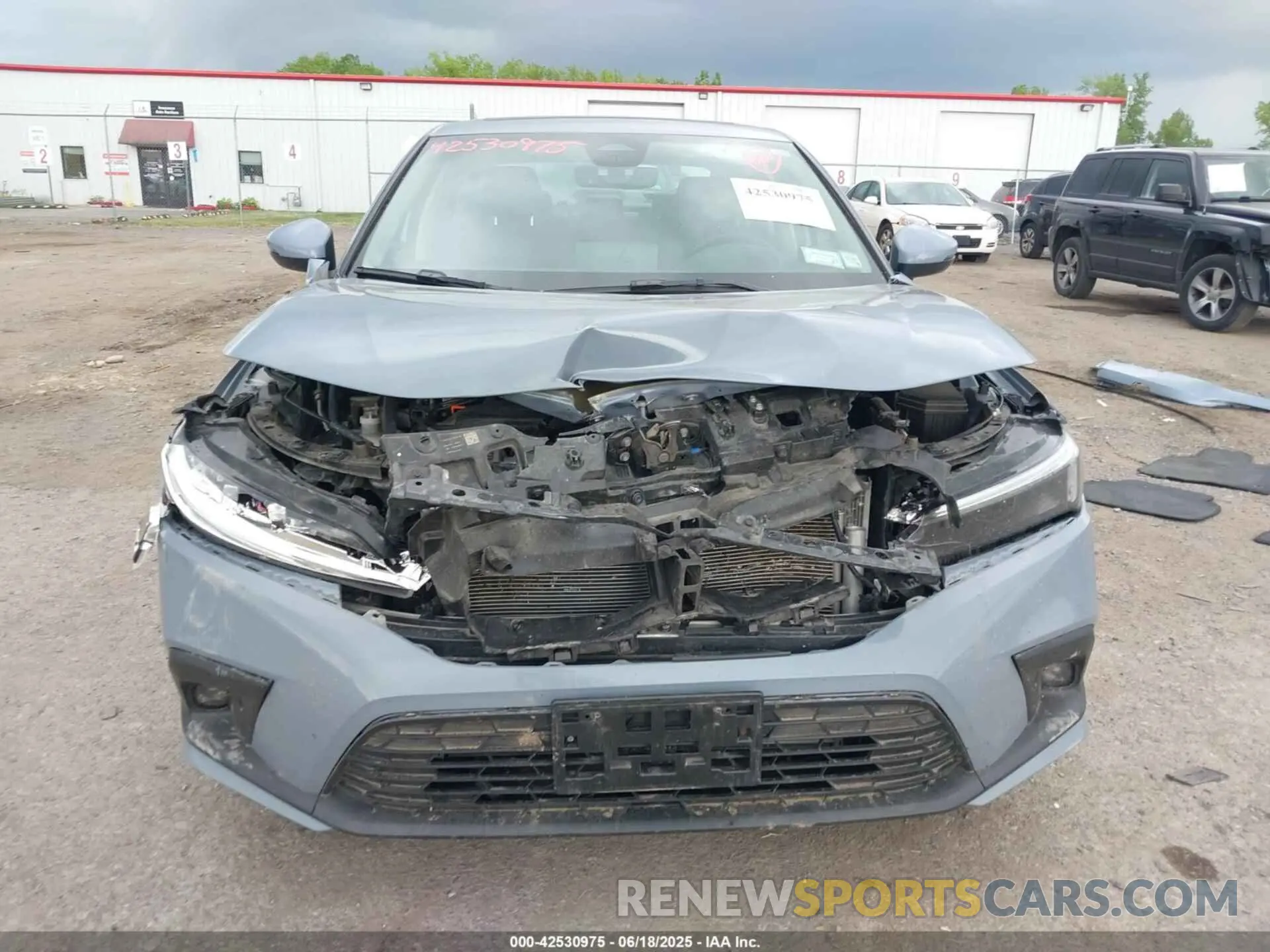 12 fotografías del automóvil dañado 2HGFE1F94NH313631 HONDA CIVIC 2022