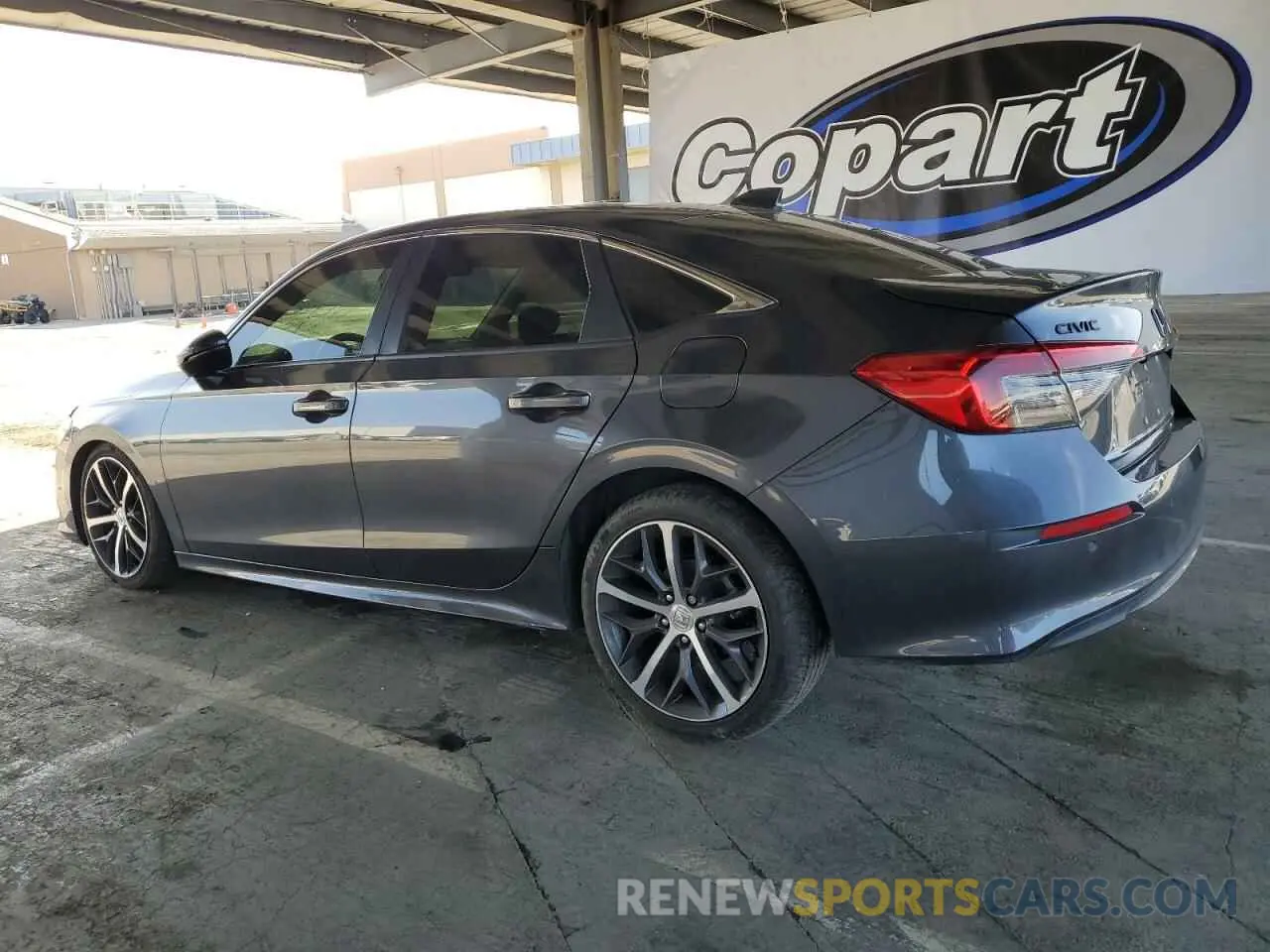 2 fotografías del automóvil dañado 2HGFE1F97NH305376 HONDA CIVIC 2022