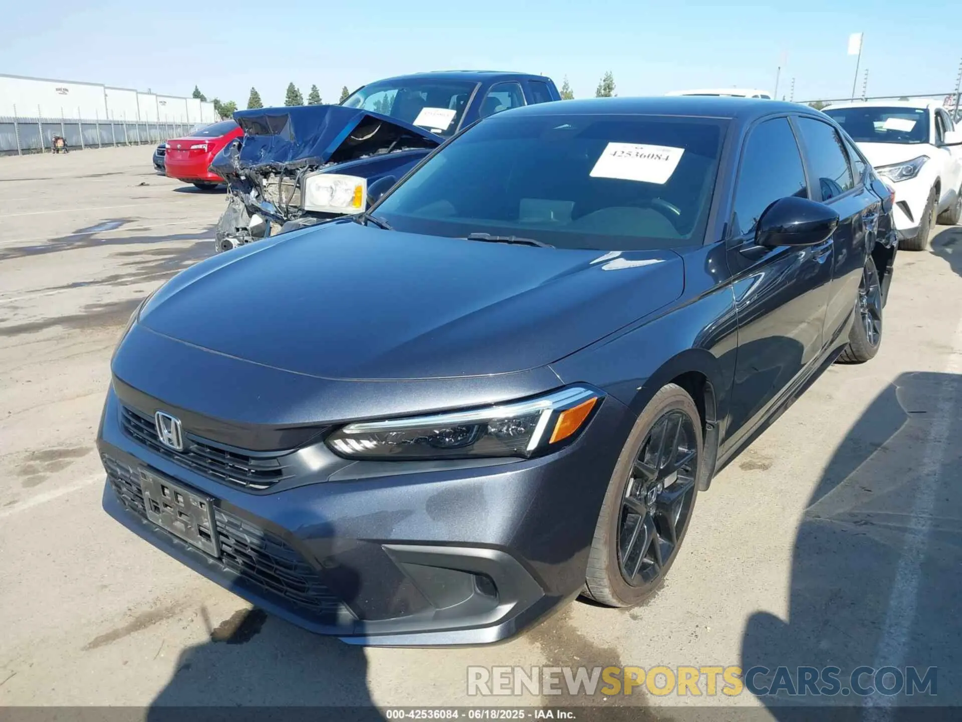 2 fotografías del automóvil dañado 2HGFE2F52NH517427 HONDA CIVIC 2022