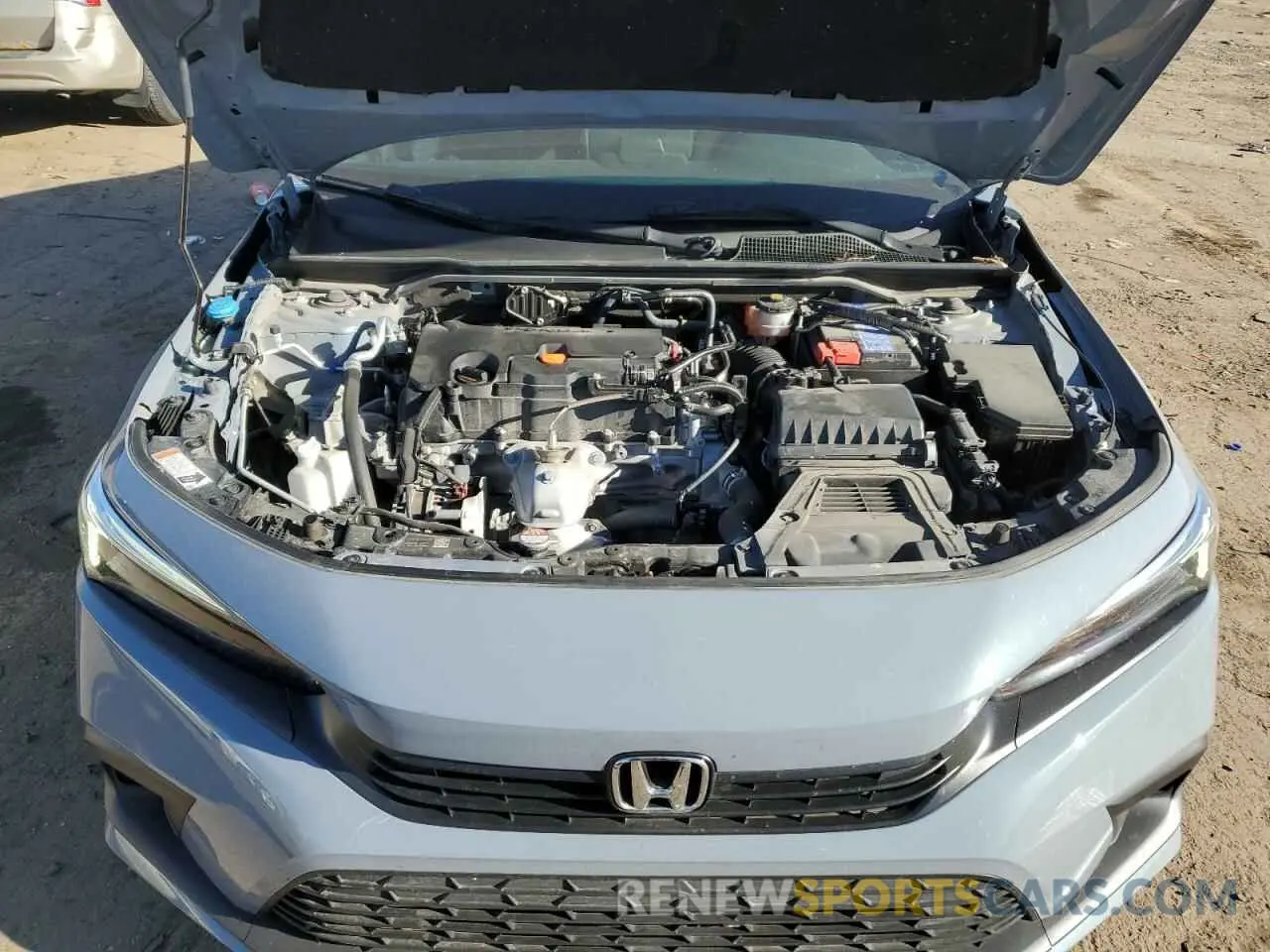11 fotografías del automóvil dañado 2HGFE2F54NH561400 HONDA CIVIC 2022