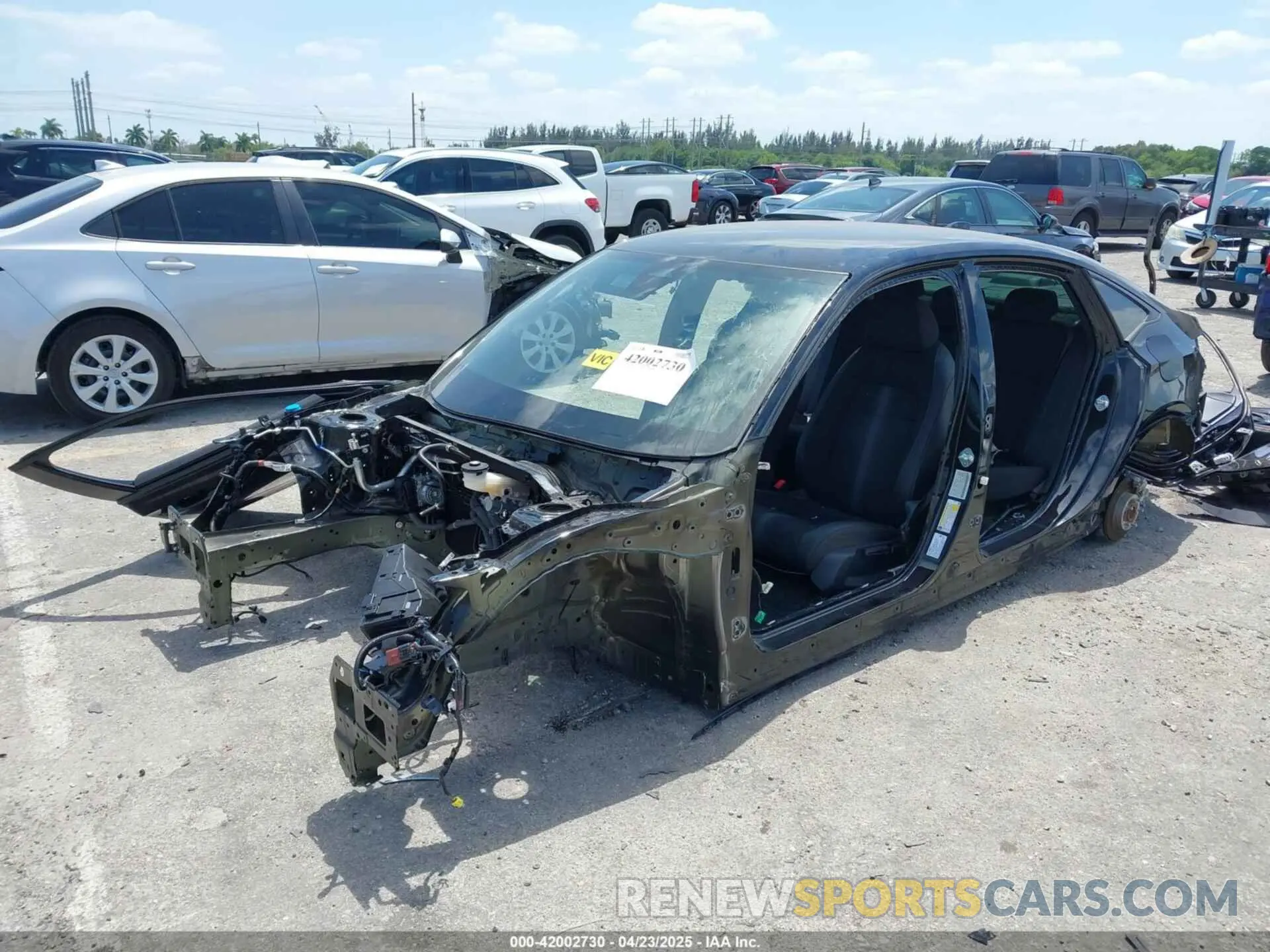 2 fotografías del automóvil dañado 2HGFE2F54NH591870 HONDA CIVIC 2022