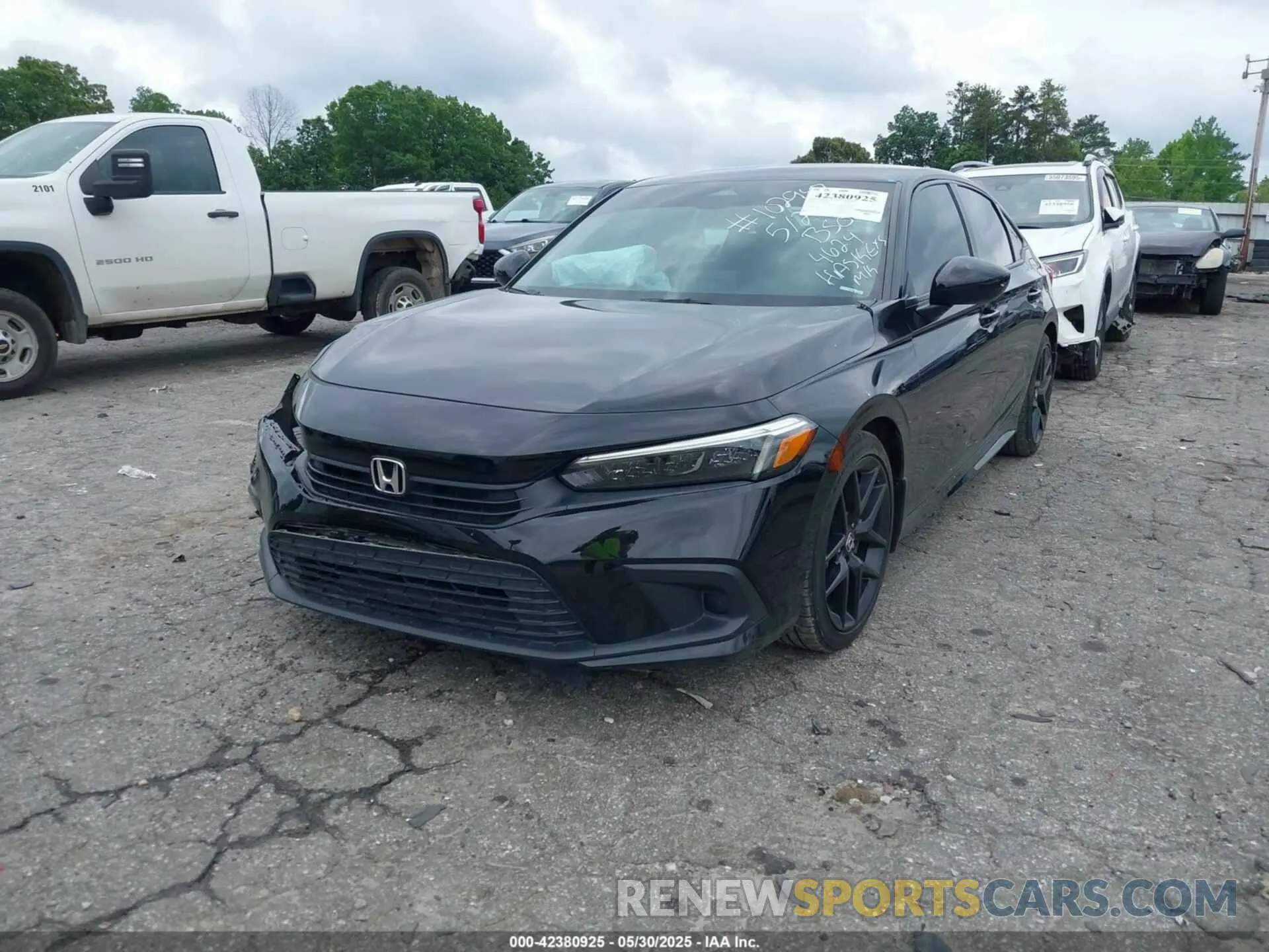 2 fotografías del automóvil dañado 2HGFE2F56NH524624 HONDA CIVIC 2022