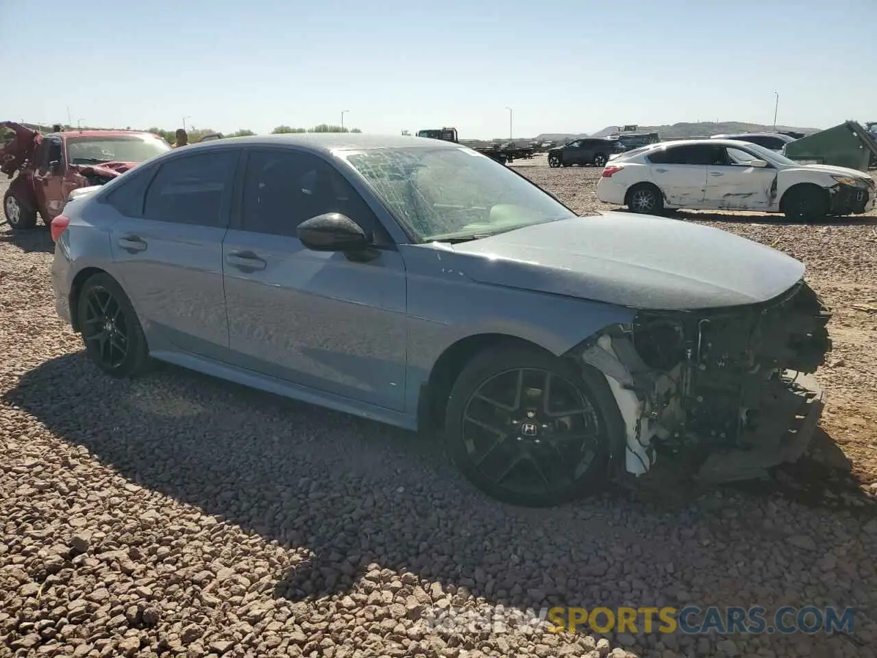 4 fotografías del automóvil dañado 2HGFE2F57NH592950 HONDA CIVIC 2022