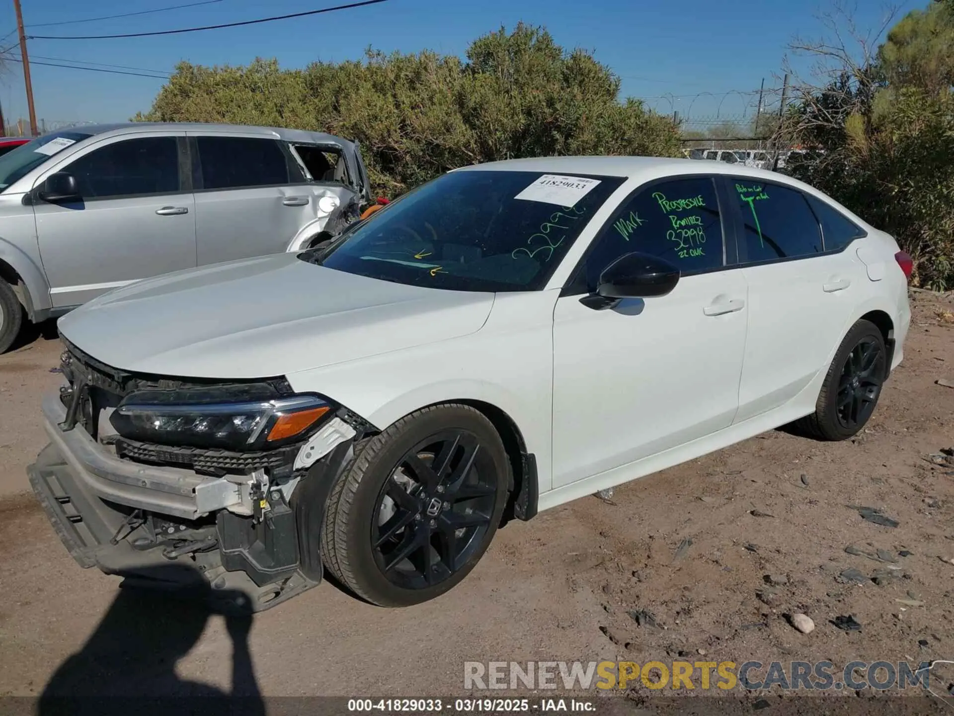 2 fotografías del automóvil dañado 2HGFE2F5XNH604976 HONDA CIVIC 2022