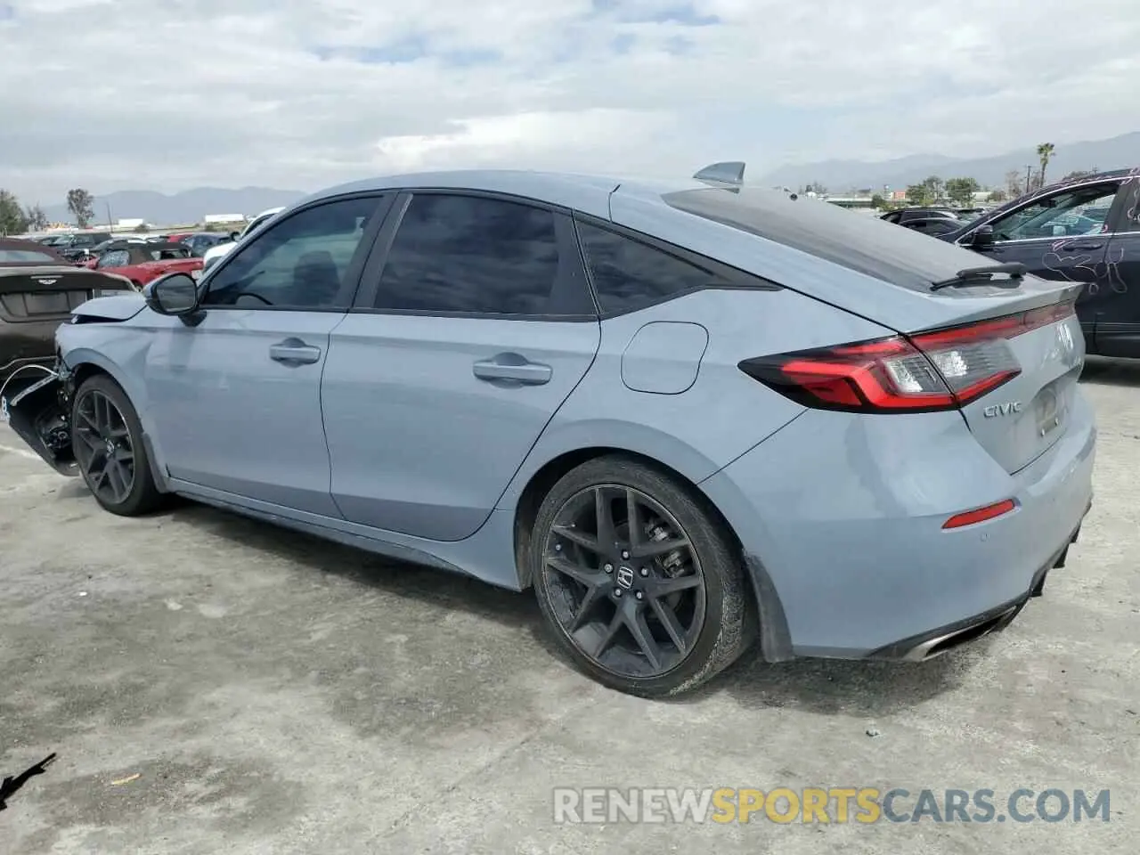 2 fotografías del automóvil dañado 19XFL1G81PE012579 HONDA CIVIC 2023