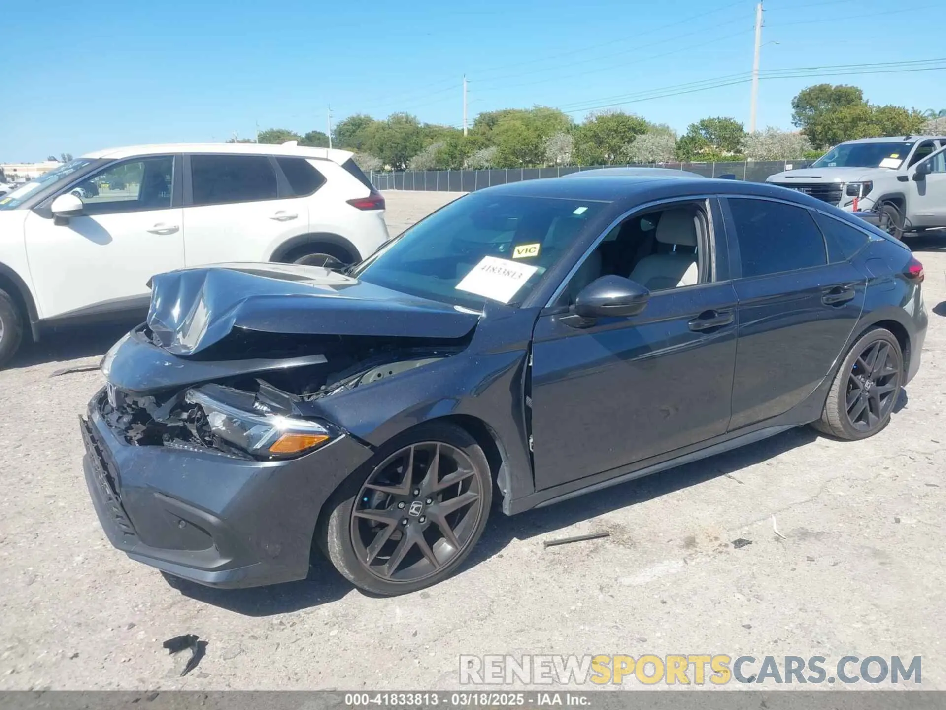 2 fotografías del automóvil dañado 19XFL1H80PE017819 HONDA CIVIC 2023