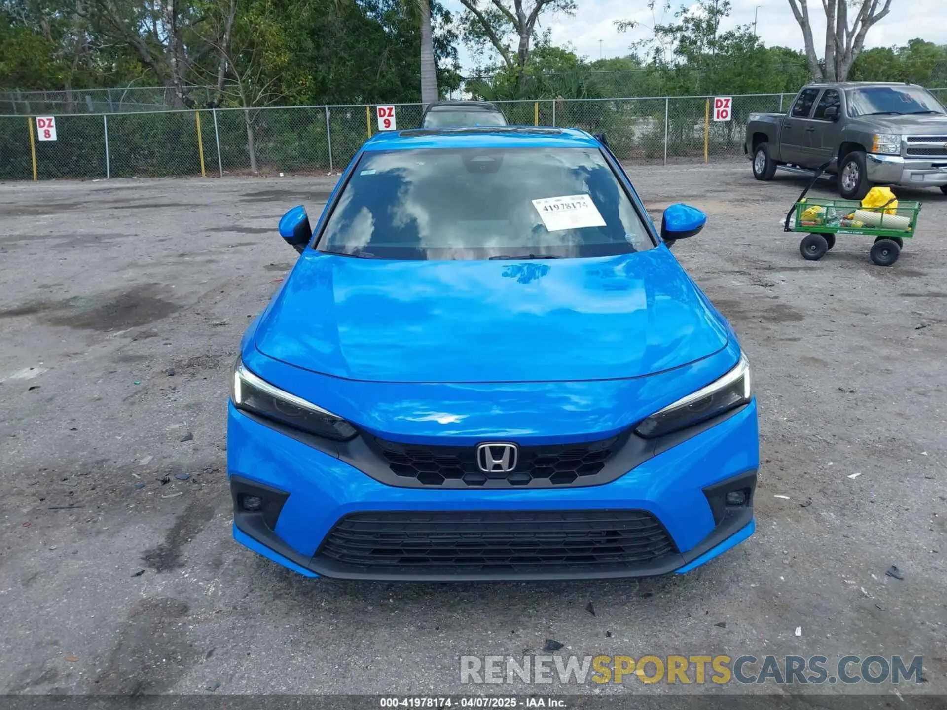 12 fotografías del automóvil dañado 19XFL1H84PE002868 HONDA CIVIC 2023