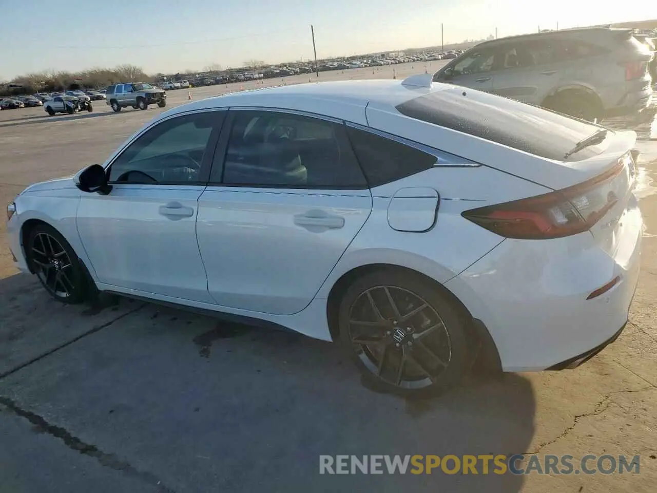 2 fotografías del automóvil dañado 19XFL1H85PE006458 HONDA CIVIC 2023