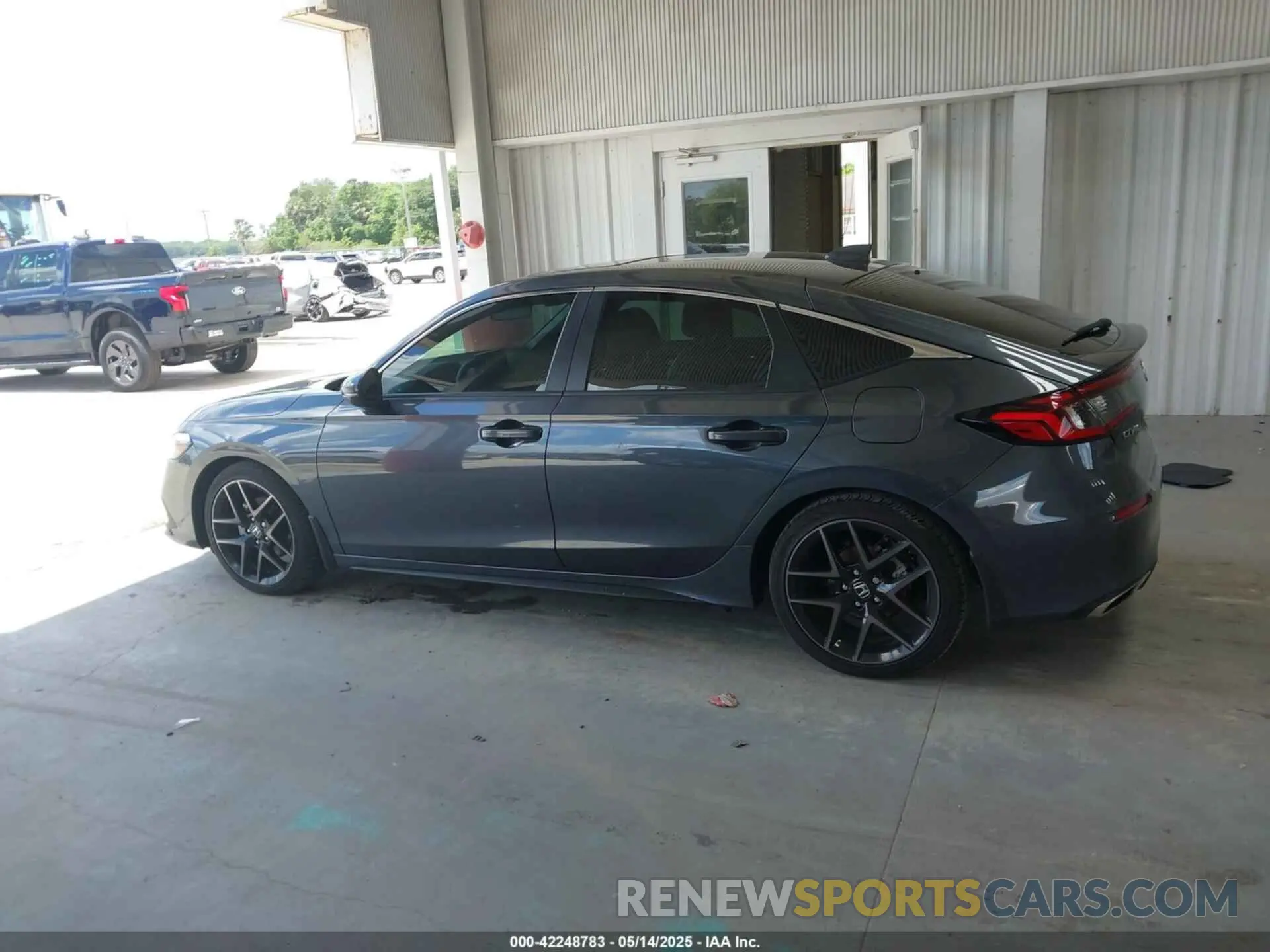 14 fotografías del automóvil dañado 19XFL1H85PE012387 HONDA CIVIC 2023