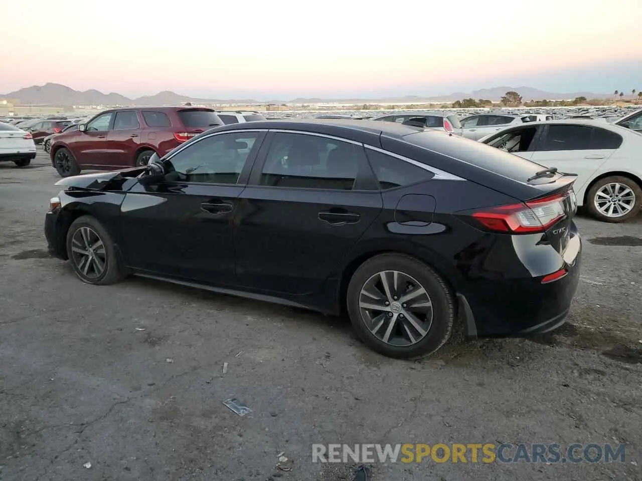 2 fotografías del automóvil dañado 19XFL2H5XPE021114 HONDA CIVIC 2023