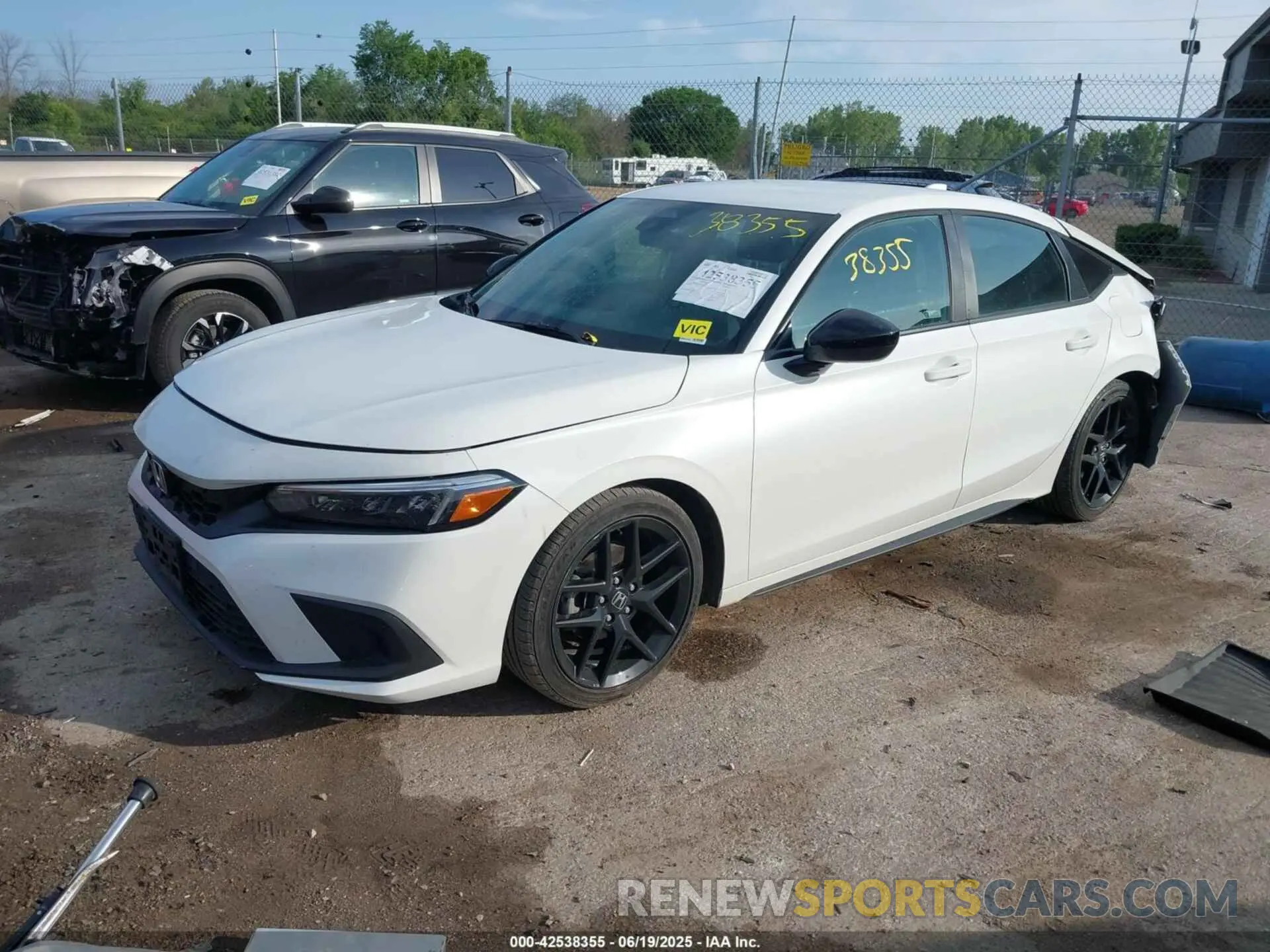 2 fotografías del automóvil dañado 19XFL2H82PE018802 HONDA CIVIC 2023