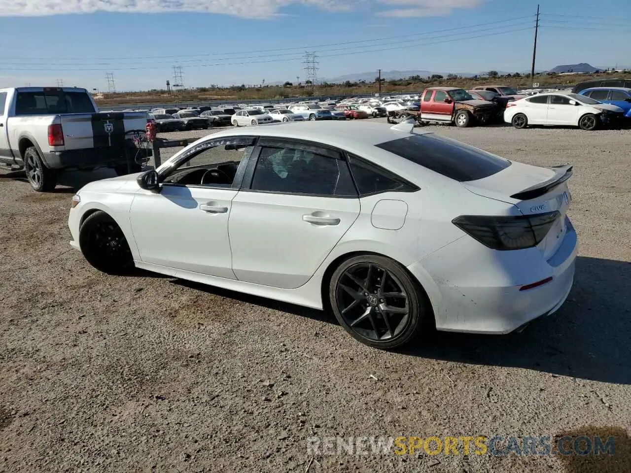 2 fotografías del automóvil dañado 2HGFE1E56PH472409 HONDA CIVIC 2023