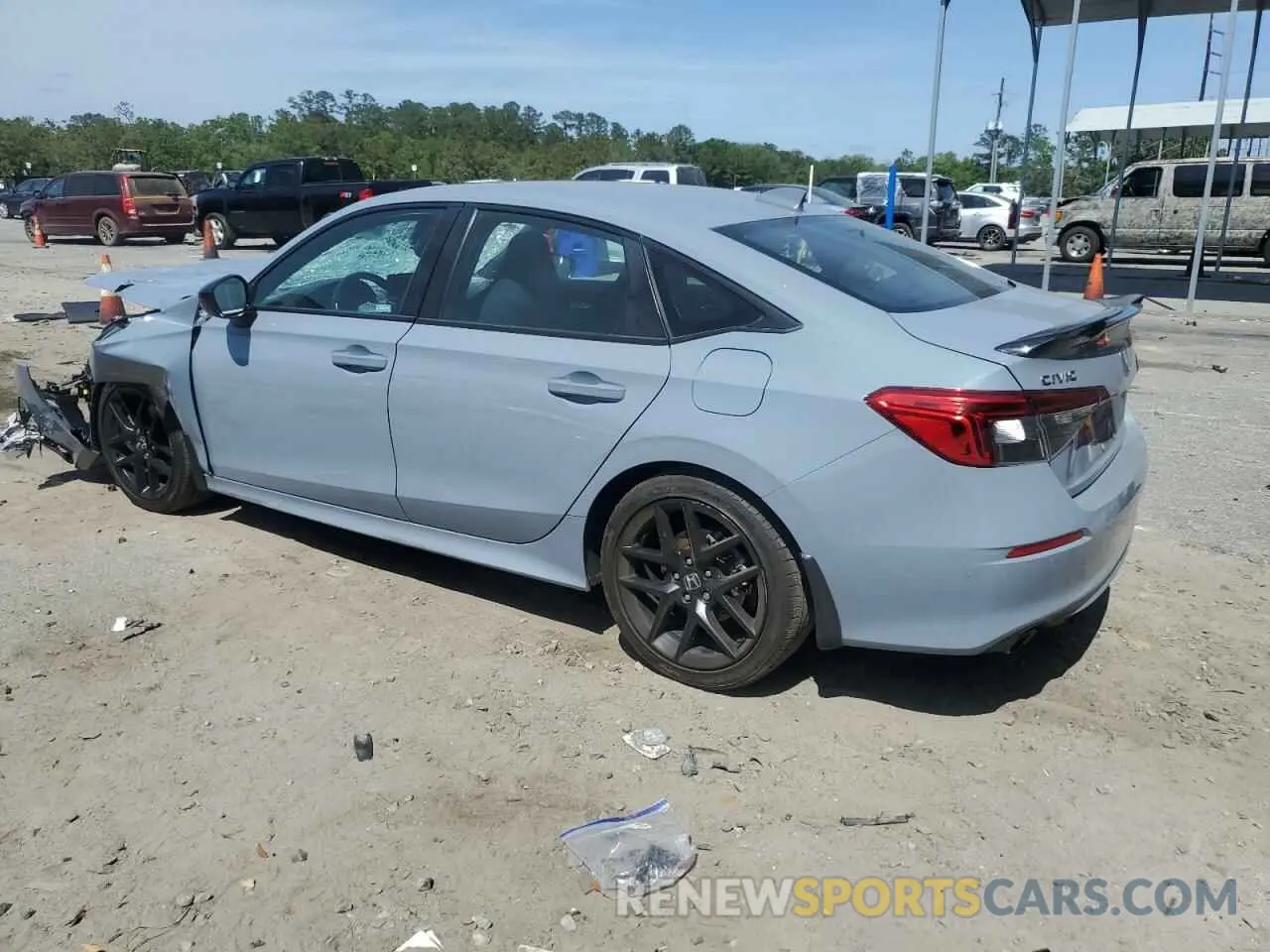 2 fotografías del automóvil dañado 2HGFE1E5XPH475152 HONDA CIVIC 2023