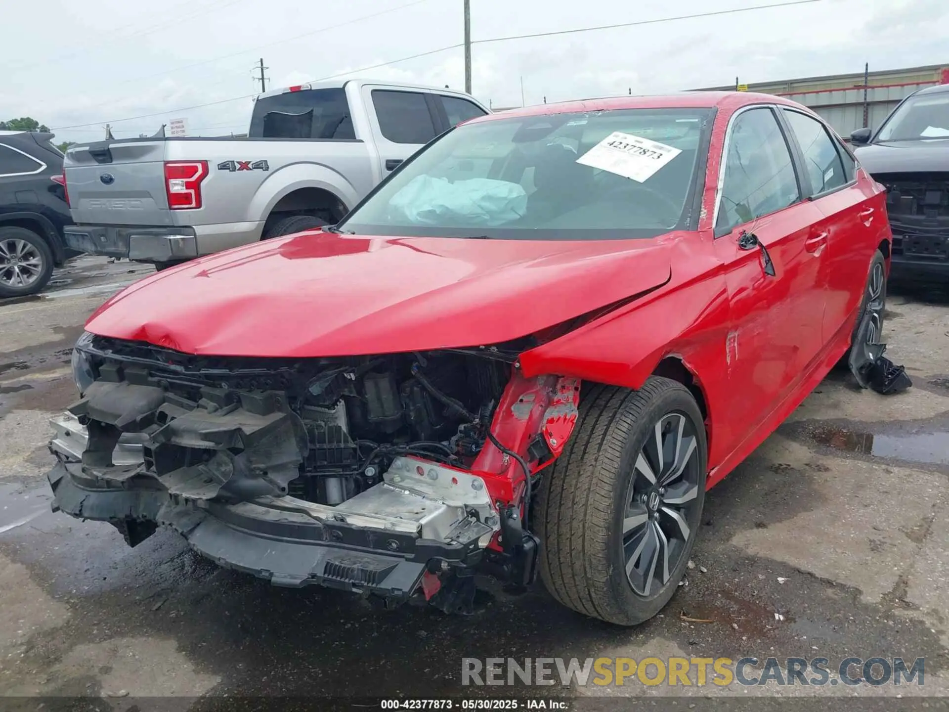 2 fotografías del automóvil dañado 2HGFE1F72PH309952 HONDA CIVIC 2023