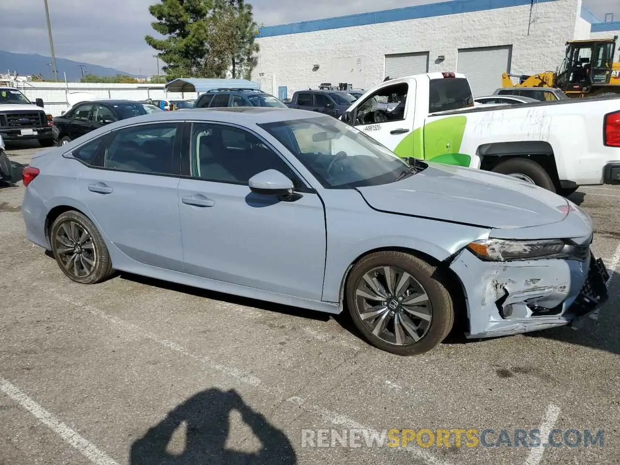4 fotografías del automóvil dañado 2HGFE1F77PH322020 HONDA CIVIC 2023