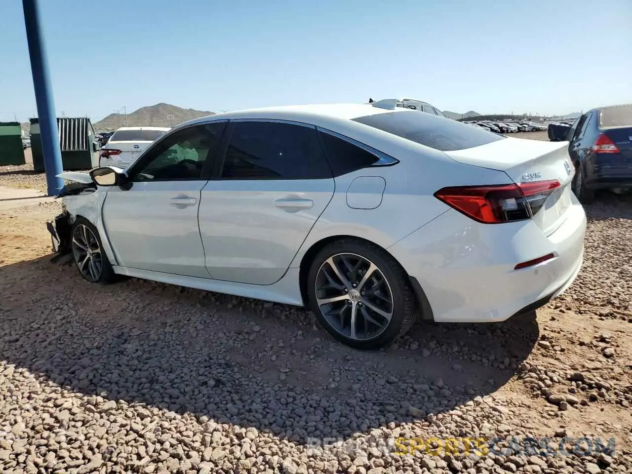 2 fotografías del automóvil dañado 2HGFE1F90PH321292 HONDA CIVIC 2023