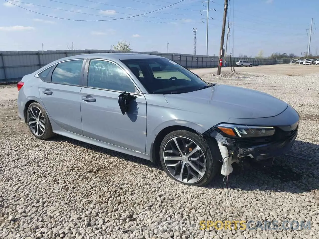 4 fotografías del automóvil dañado 2HGFE1F94PH318489 HONDA CIVIC 2023