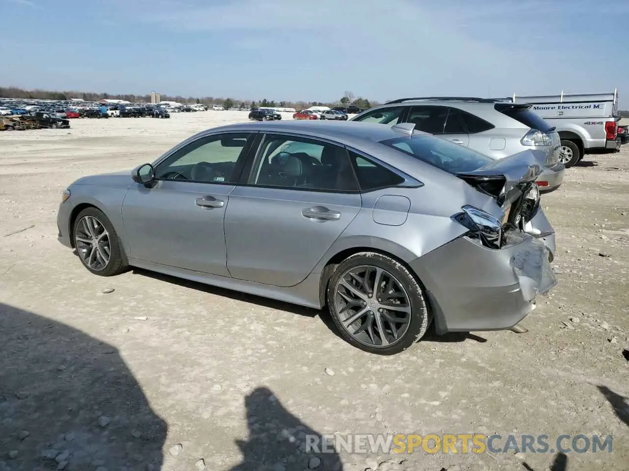 2 fotografías del automóvil dañado 2HGFE1F97PH323539 HONDA CIVIC 2023