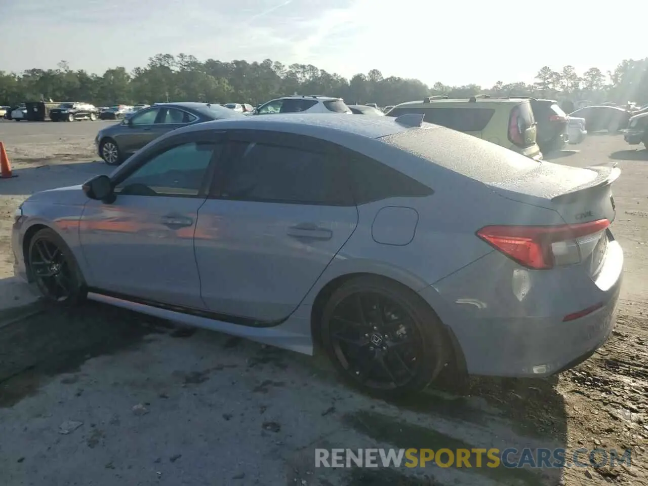2 fotografías del automóvil dañado 2HGFE2F50PH532690 HONDA CIVIC 2023