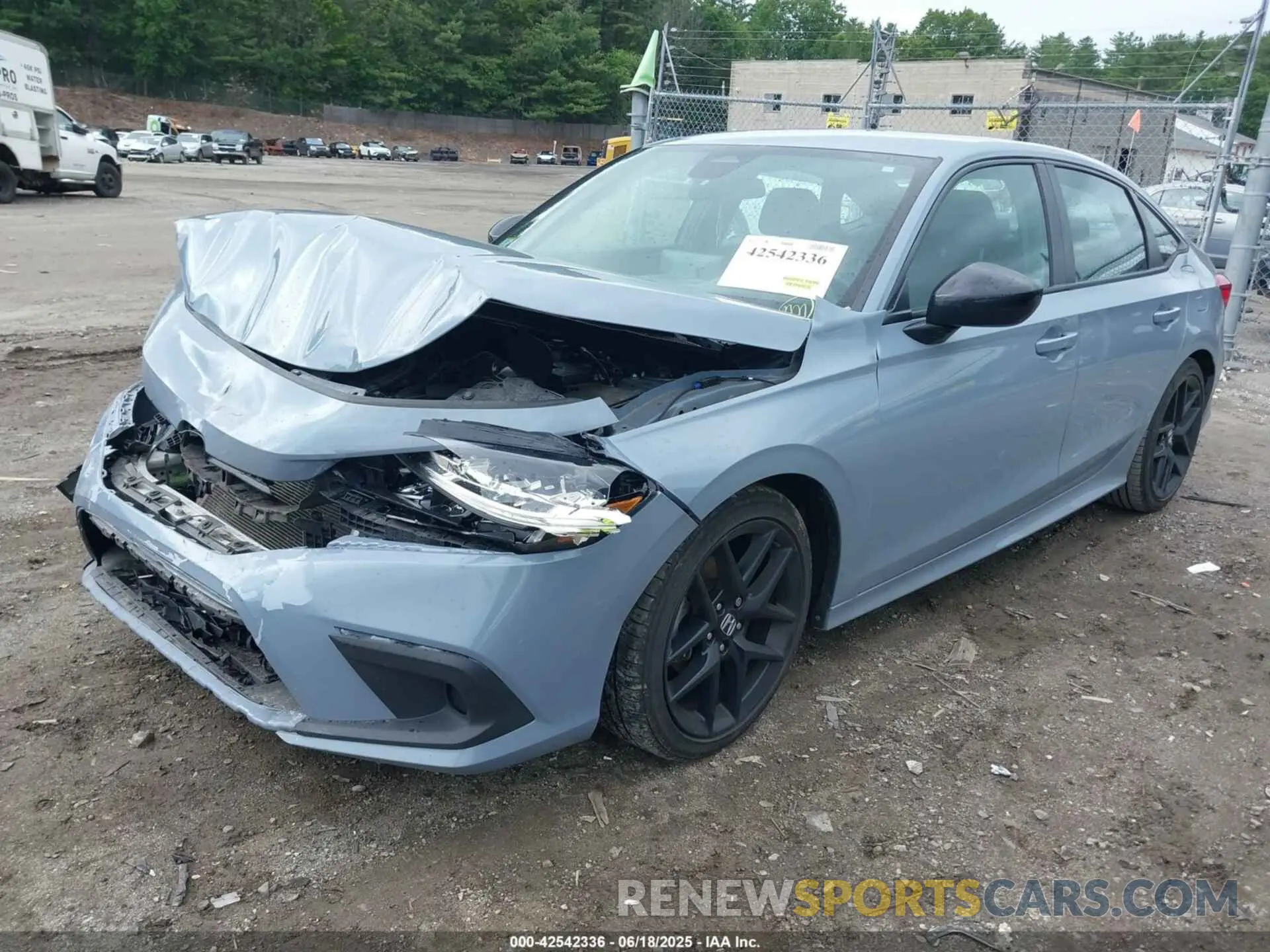 2 fotografías del automóvil dañado 2HGFE2F51PH547134 HONDA CIVIC 2023