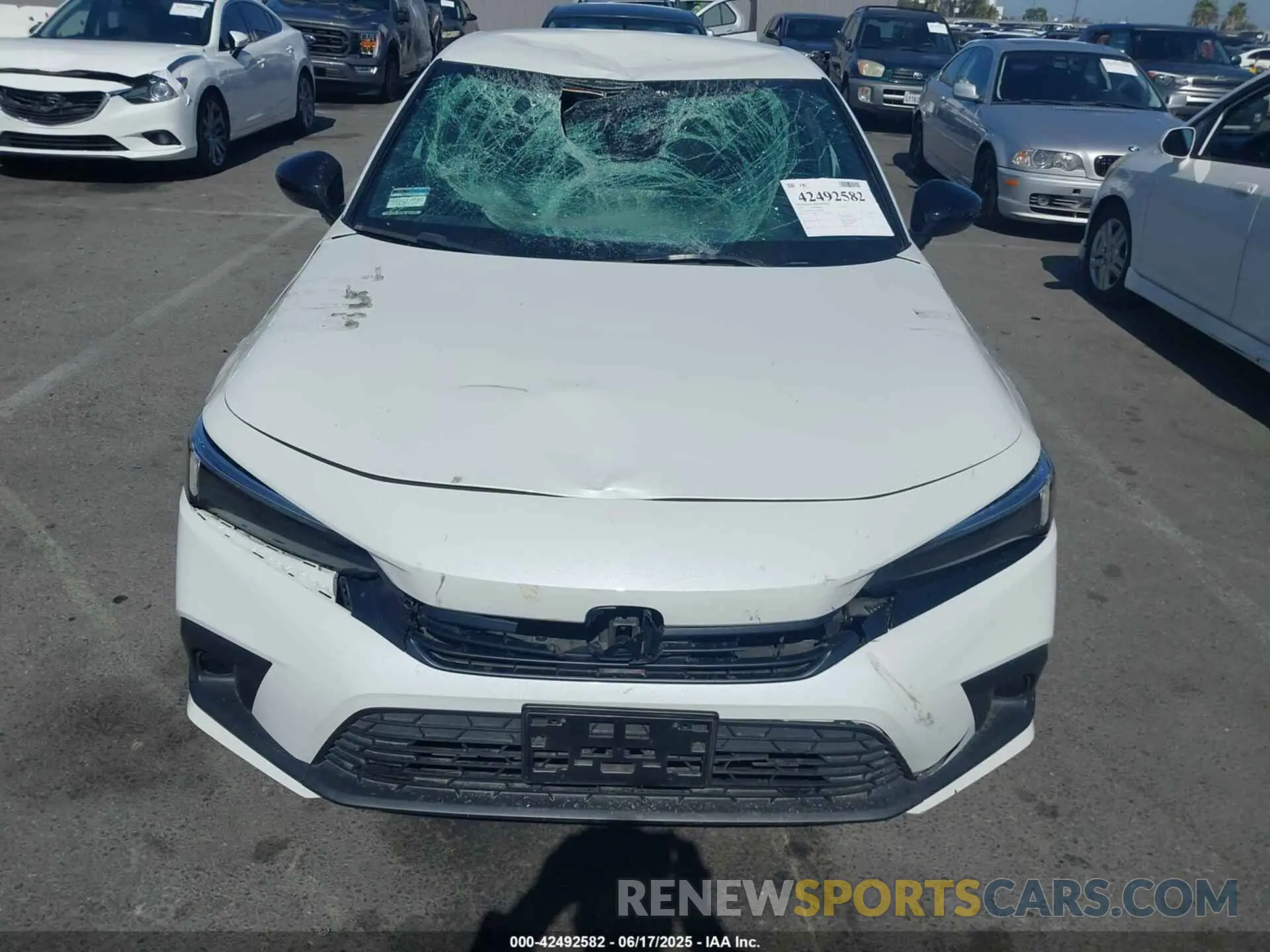 12 fotografías del automóvil dañado 2HGFE2F51PH563060 HONDA CIVIC 2023