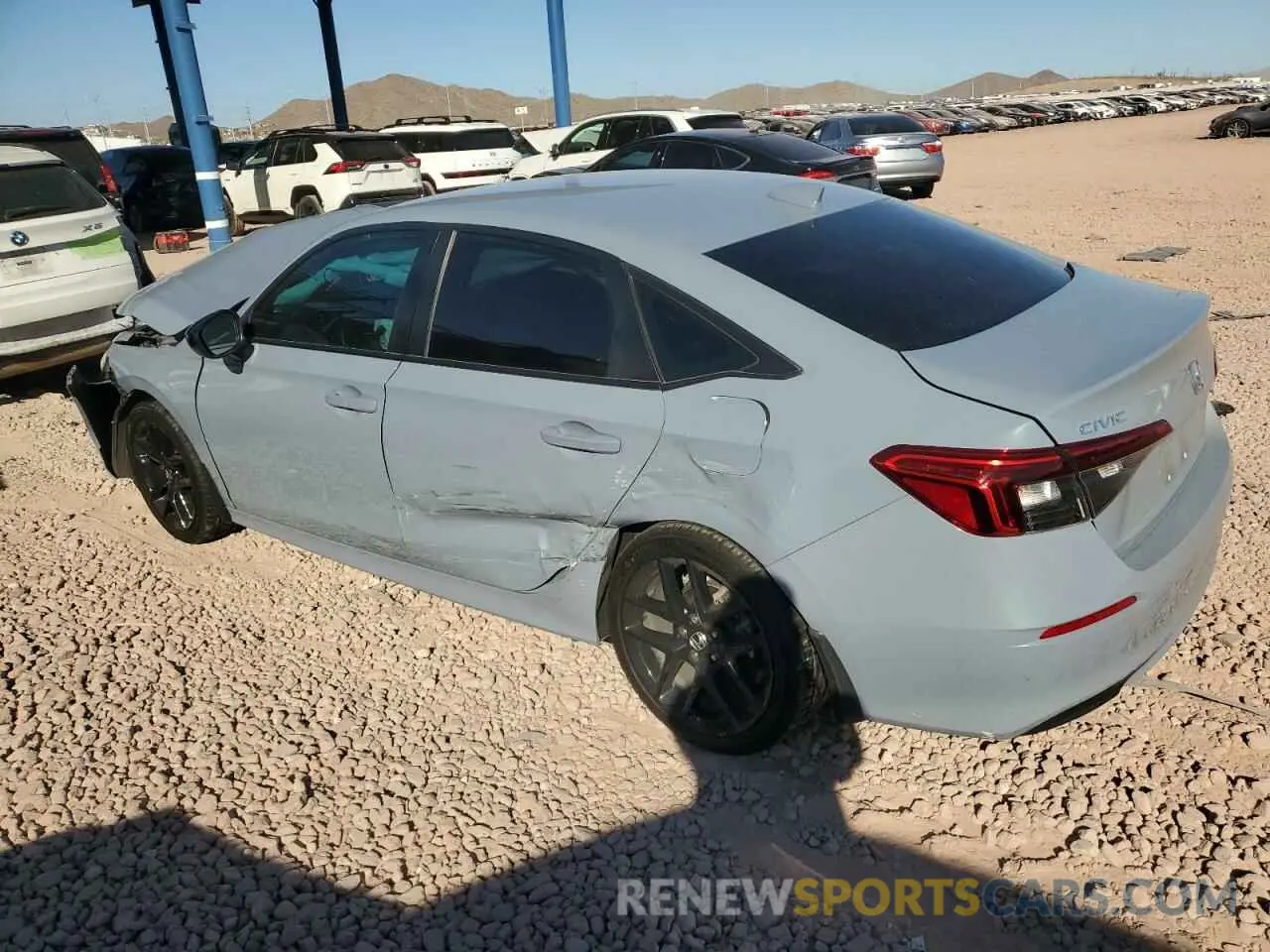 2 fotografías del automóvil dañado 2HGFE2F53PH535759 HONDA CIVIC 2023