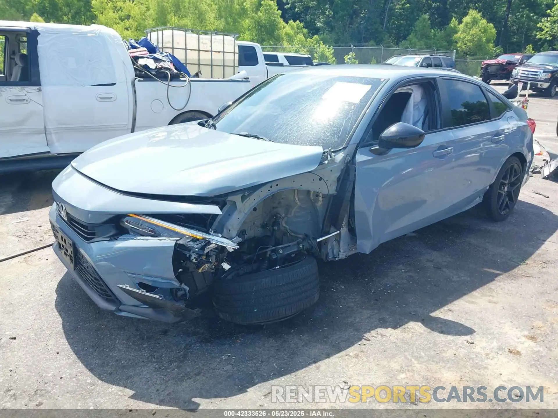2 fotografías del automóvil dañado 2HGFE2F59PH558110 HONDA CIVIC 2023