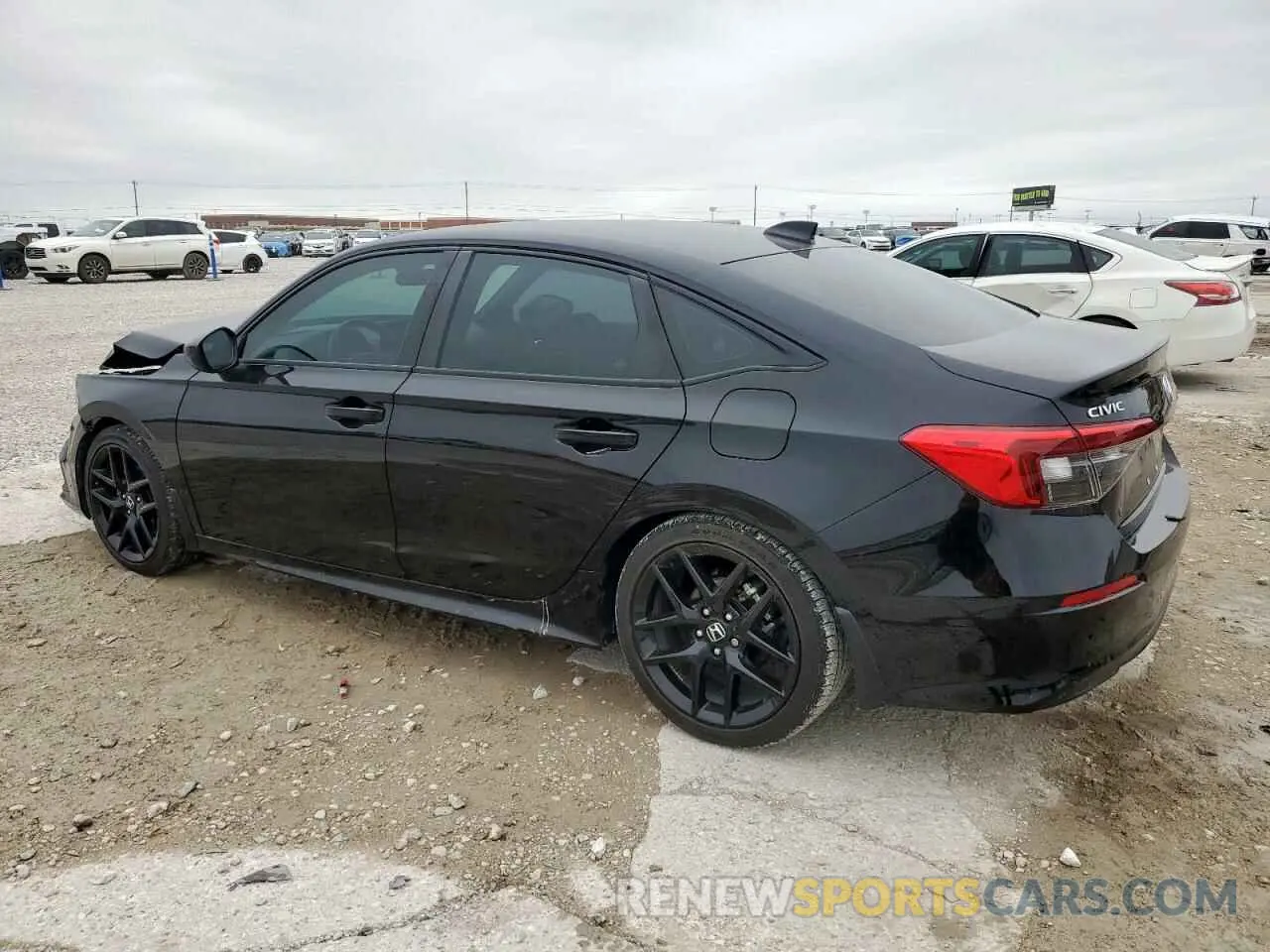 2 fotografías del automóvil dañado 2HGFE2F5XPH516982 HONDA CIVIC 2023